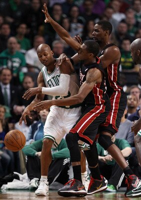 BOSTON, MA - MAY 09:  Ray Allen #20 of the Boston Celtics is pressured by James Jones #22 and Chris Bosh #1 of the Miami Heat  in Game Four of the Eastern Conference Semifinals in the 2011 NBA Playoffs on May 9, 2011 at the TD Garden in Boston, Massachuse