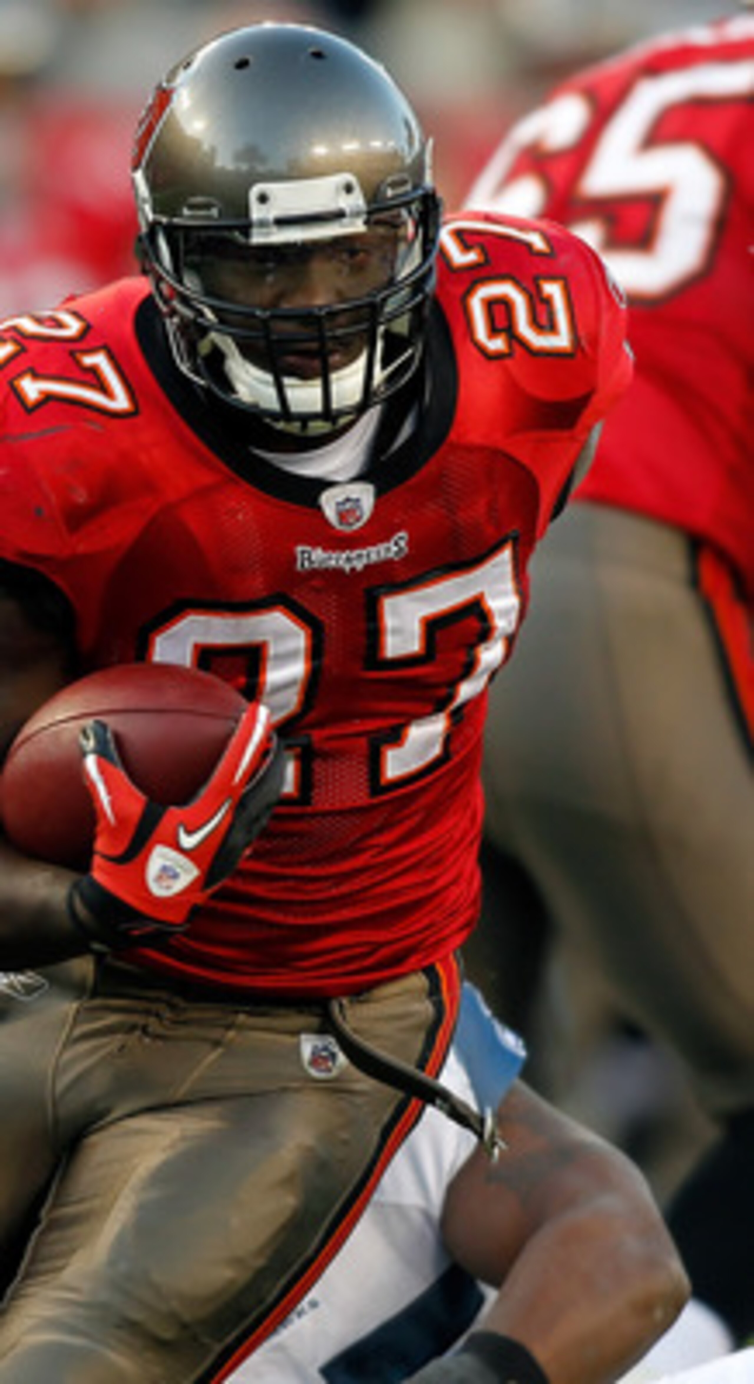 TAMPA, FL - DECEMBER 26: Running back LeGarrette Blount #27 of the Tampa Bay Buccaneers runs the ball against the Seattle Seahawks during the game at Raymond James Stadium on December 26, 2010 in Tampa, Florida. (Photo by J. Meric/Getty Images)