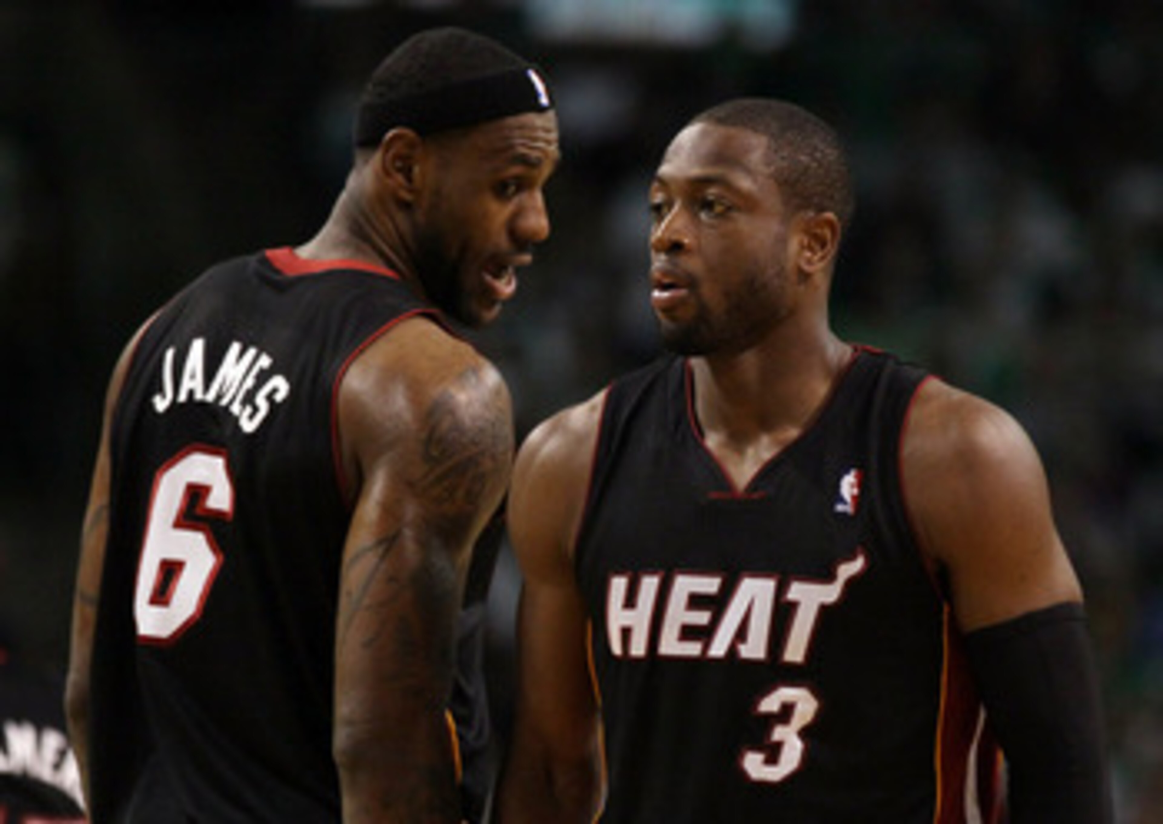 BOSTON, MA - MAY 09: LeBron James #6 talks with teamamte Dwyane Wade #3 of the Miami Heat in Game Four of the Eastern Conference Semifinals in the 2011 NBA Playoffs on May 9, 2011 at the TD Garden in Boston, Massachusetts.  The Miami Heat defeated the Bos
