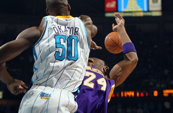 NEW ORLEANS, LA - APRIL 28:  Kobe Bryant #24 of the Los Angeles Lakers is blocked by Emeka Okafor #50 of the New Orleans Hornets in Game Six of the Western Conference Quarterfinals in the 2011 NBA Playoffs on April 28, 2011 at New Orleans Arena in New Orl