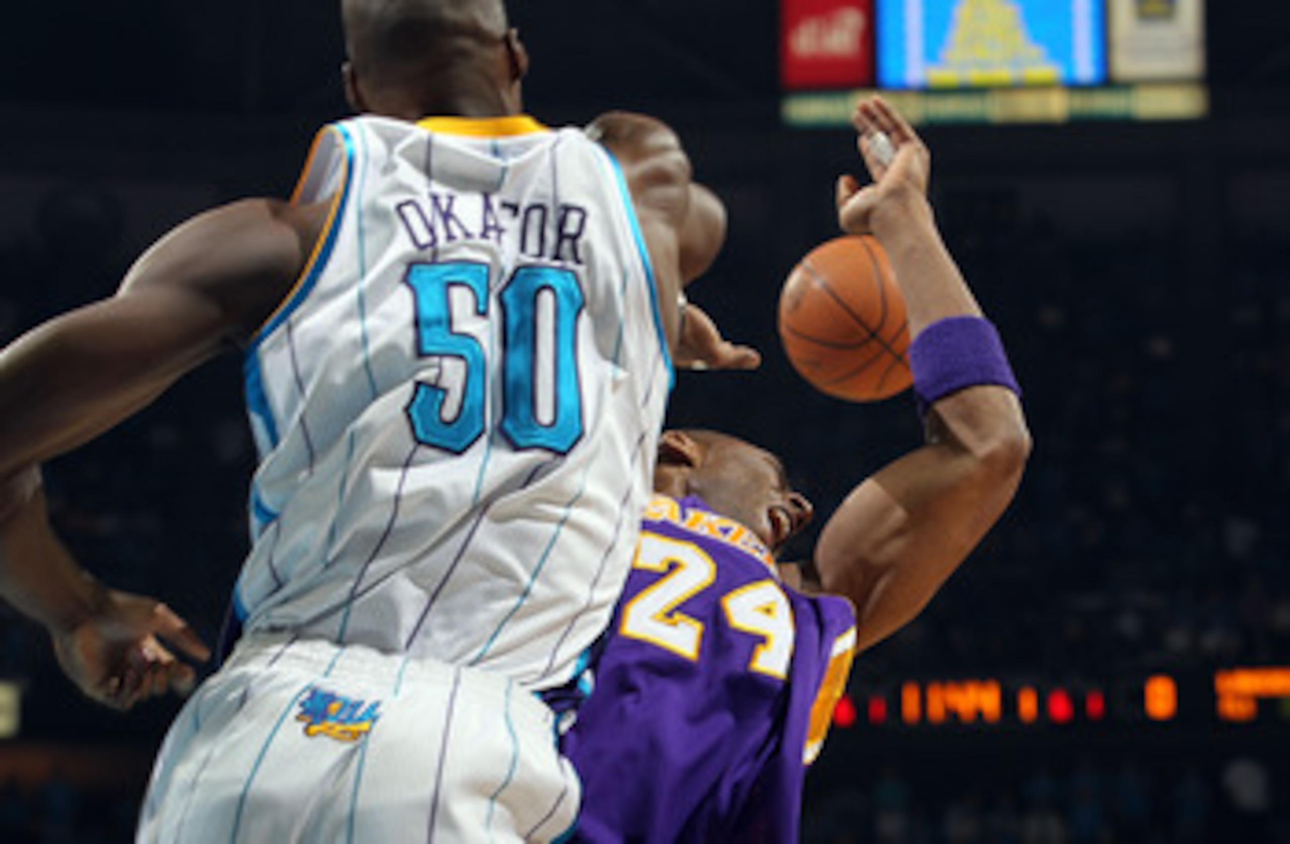 NEW ORLEANS, LA - APRIL 28:  Kobe Bryant #24 of the Los Angeles Lakers is blocked by Emeka Okafor #50 of the New Orleans Hornets in Game Six of the Western Conference Quarterfinals in the 2011 NBA Playoffs on April 28, 2011 at New Orleans Arena in New Orl