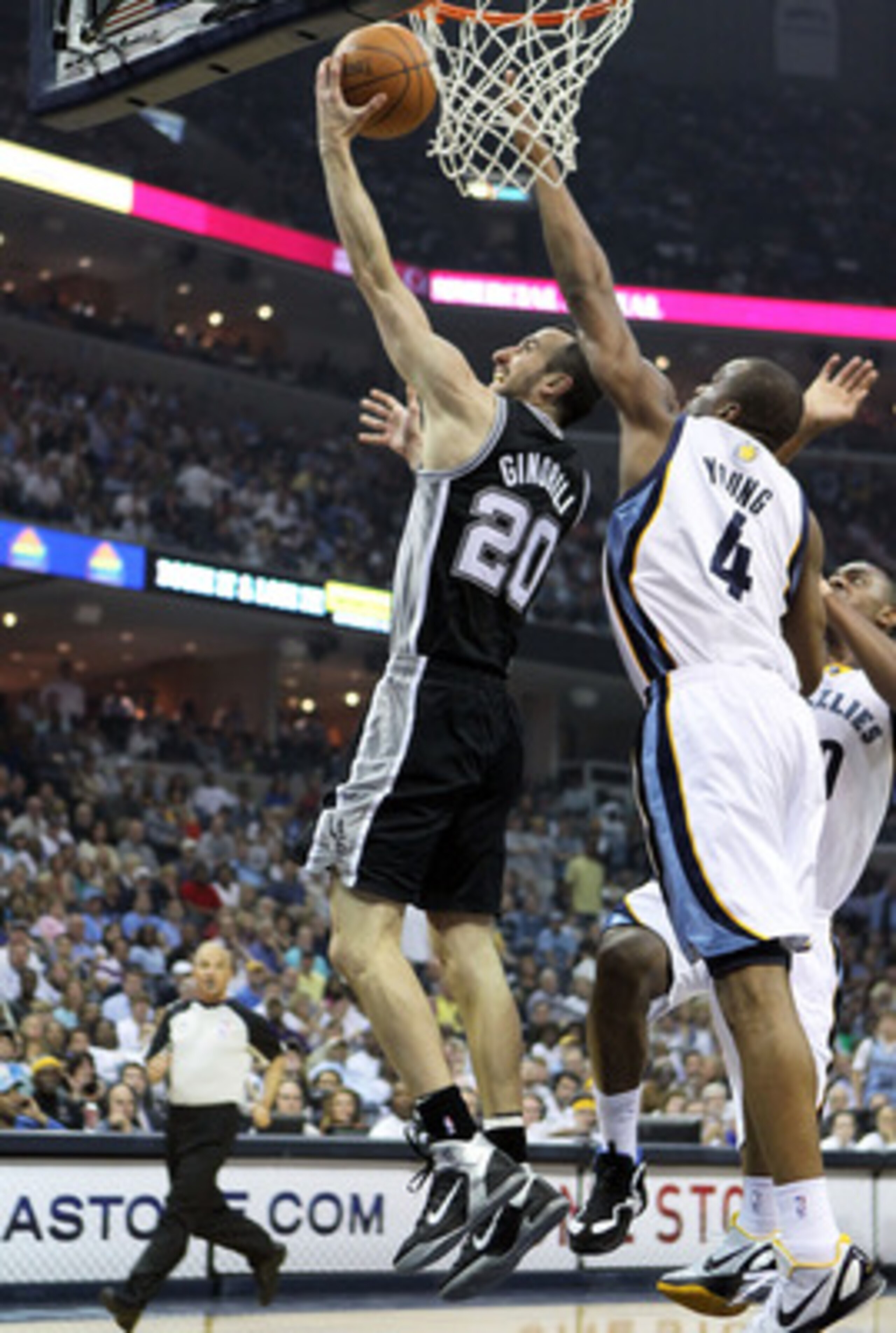MEMPHIS, TN - APRIL 29:  Manu Ginobili #20 of the San Antonio Spurs shoots the ball while defended by Sam Young #4 of the Memphis Grizzlies in Game Six of the Western Conference Quarterfinals in the 2011 NBA Playoffs at FedExForum on April 29, 2011 in Mem