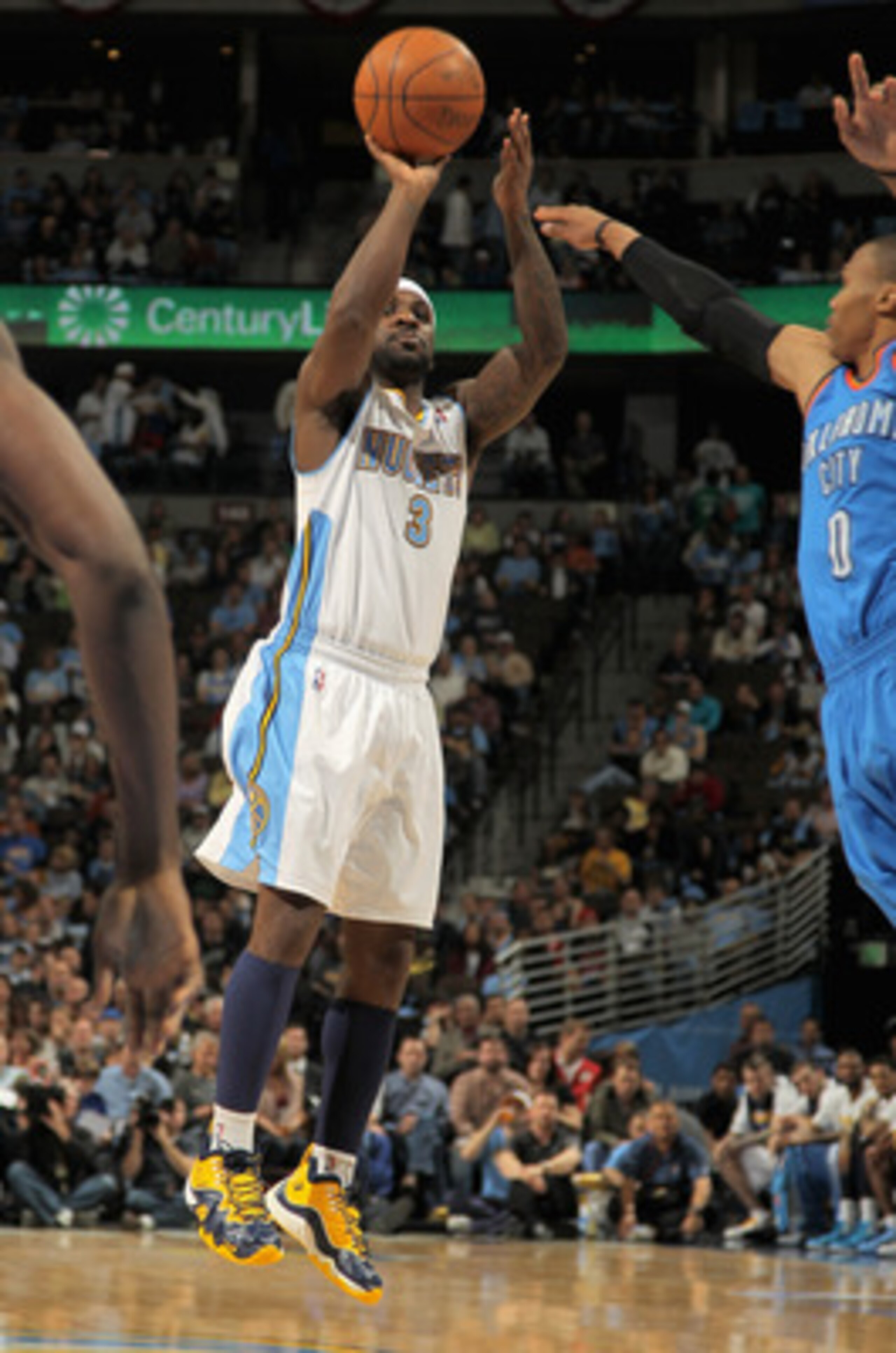 DENVER, CO - APRIL 25:  Ty Lawson #3 of the Denver Nuggets takes a shot against Russell Westbrook #0 of the Oklahoma City Thunder in Game Four of the Western Conference Quarterfinals in the 2011 NBA Playoffs on April 24, 2011 at the Pepsi Center in Denver
