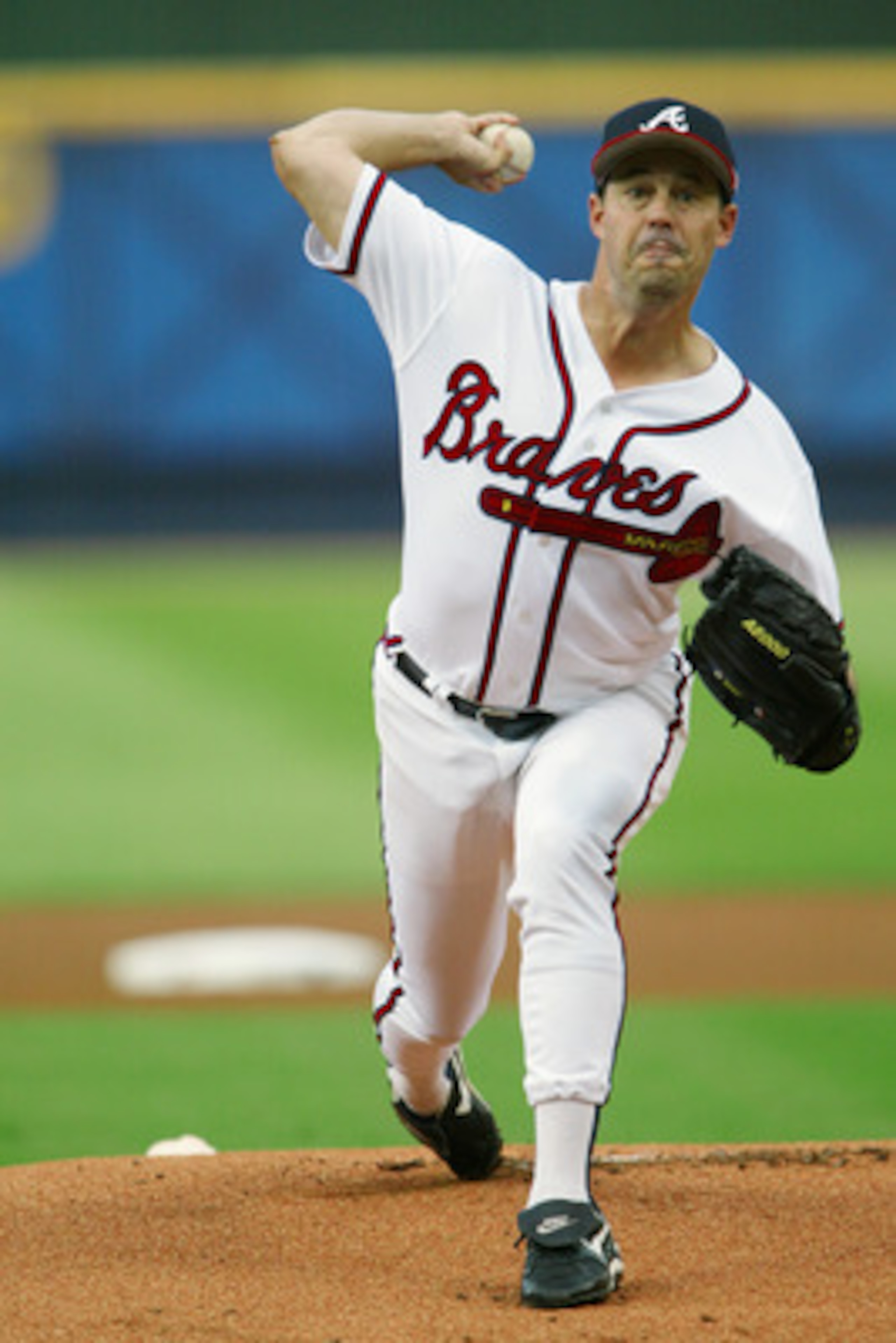 ATLANTA, GA - JULY 5: Starting pitcher Greg Maddux #31 of the Atlanta Braves warms-up just prior to the game against the Montreal Expos at Turner Field on July 5, 2003 in Atlanta, Georgia. The Braves won 3-2. (Photo by Jamie Squire/Getty Images) ATLANTA, GA - JULY 5: Starting pitcher Greg Maddux #31 of the Atlanta Braves warms-up just prior to the game against the Montreal Expos at Turner Field on July 5, 2003 in Atlanta, Georgia. The Braves won 3-2. (Photo by Jamie Squire/Getty Images)