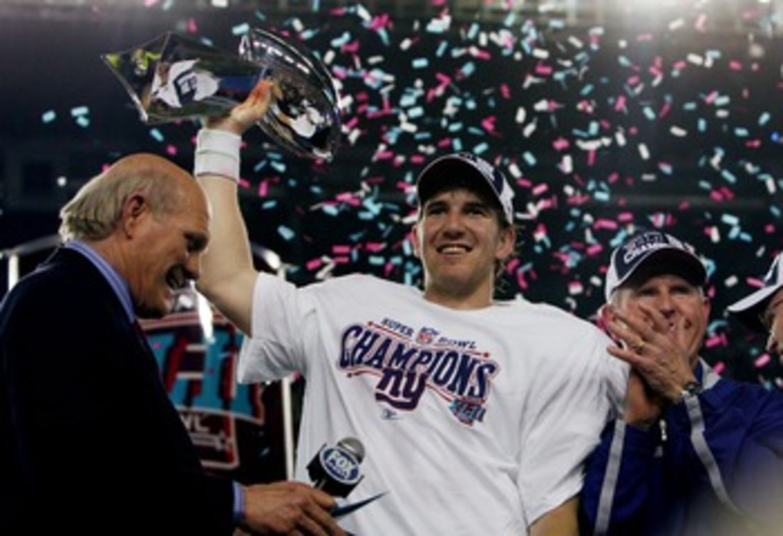 GLENDALE, AZ - FEBRUARY 03:  Quarterback Eli Manning #10 of the New York Giants holds the Vince Lombardi Trophy after defeating the New England Patriots 17-14 in Super Bowl XLII on February 3, 2008 at the University of Phoenix Stadium in Glendale, Arizona