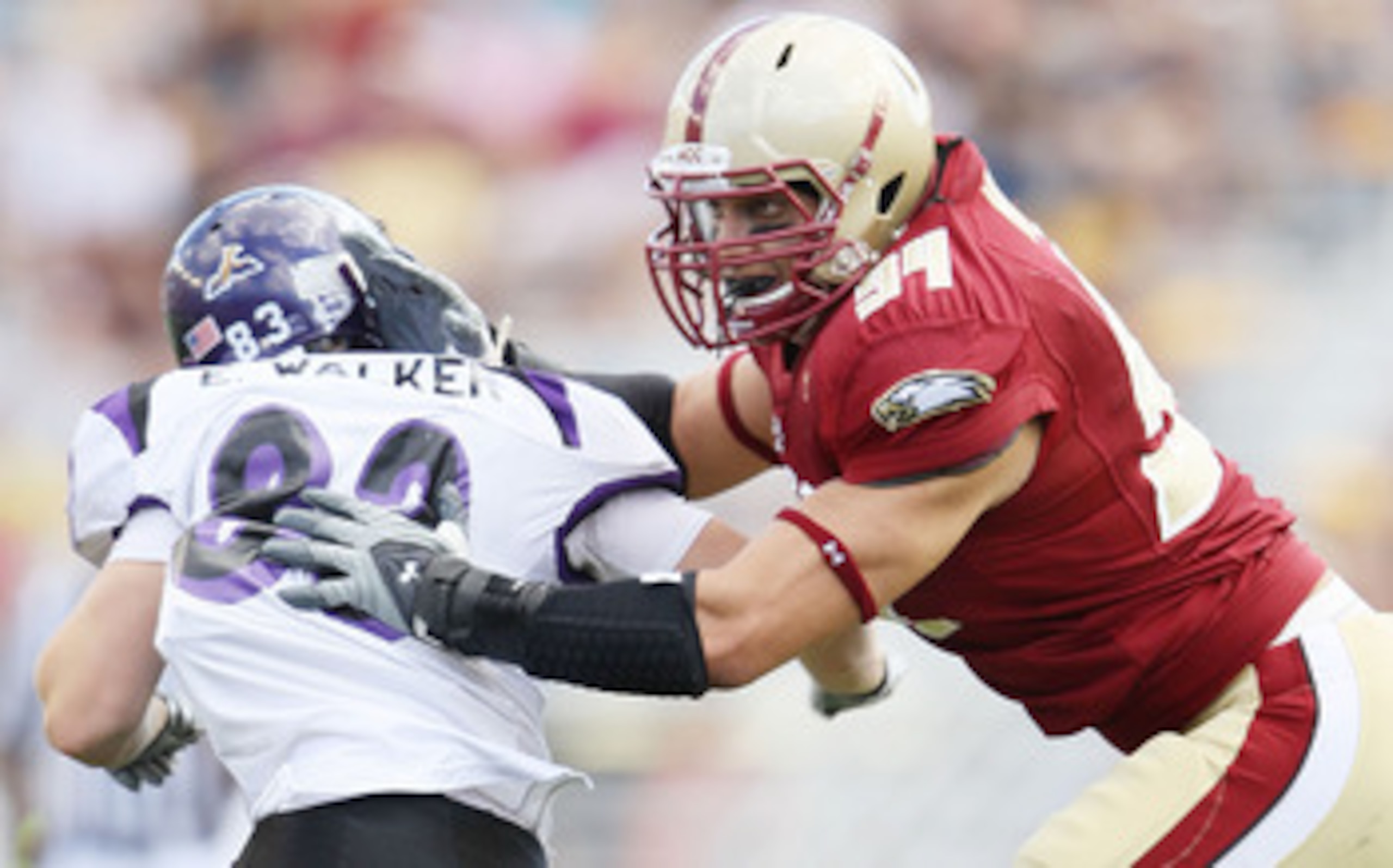 CHESTNUT HILL, MA - SEPTEMBER 04:  Mark Herzlich #94 of the Boston College Eagles blocks Erik Walker #83 of the Weber State Wildcats on September 4, 2010 at Alumni Stadium in Chestnut Hill, Massachusetts. Boston College defeated Weber State 38-20.  (Photo