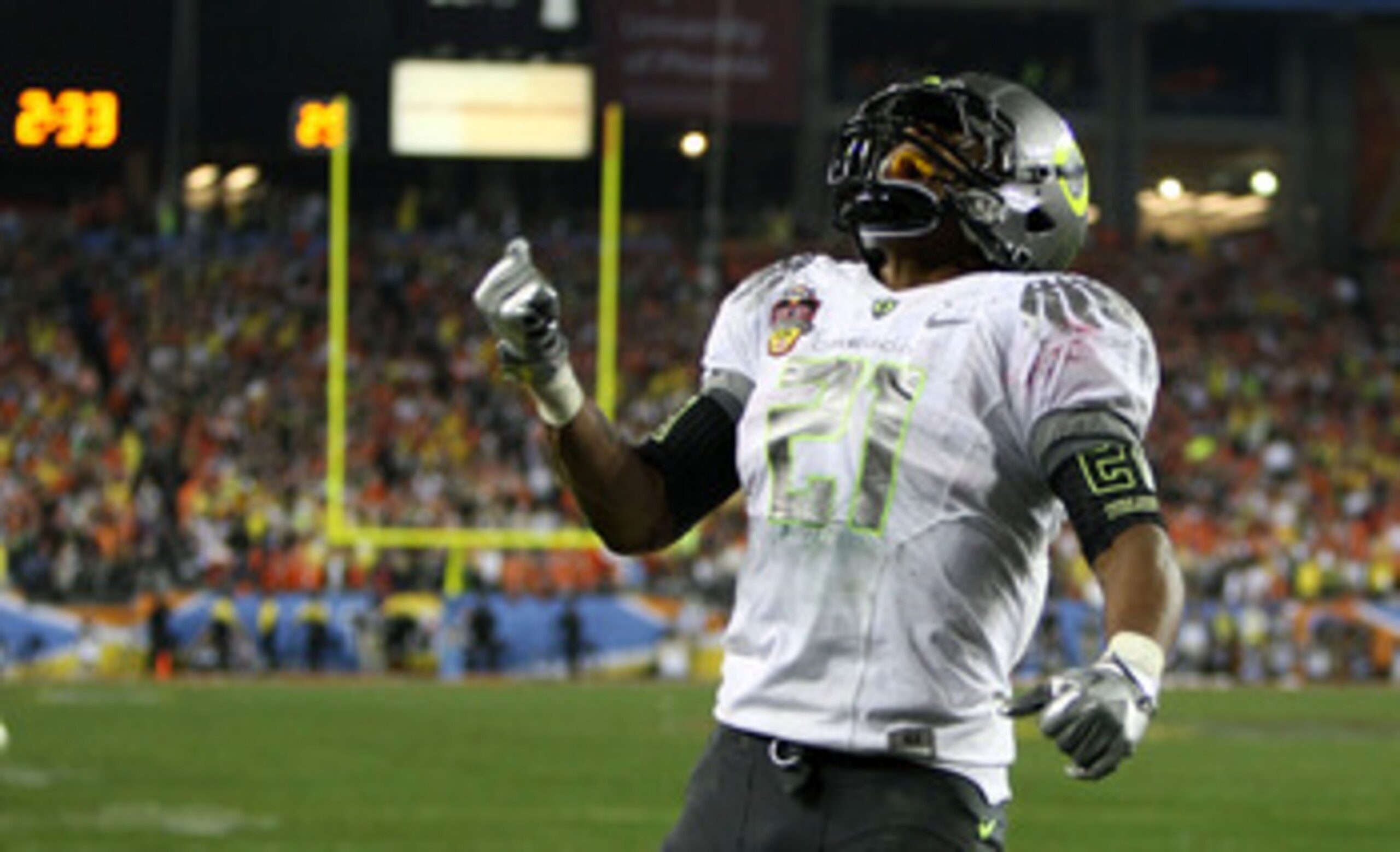 GLENDALE, AZ - JANUARY 10: LaMichael James #21 of the Oregon Ducks reacts during their game against the Auburn Tigers during the Tostitos BCS National Championship Game at University of Phoenix Stadium on January 10, 2011 in Glendale, Arizona. (Photo by GLENDALE, AZ - JANUARY 10: LaMichael James #21 of the Oregon Ducks reacts during their game against the Auburn Tigers during the Tostitos BCS National Championship Game at University of Phoenix Stadium on January 10, 2011 in Glendale, Arizona. (Photo by