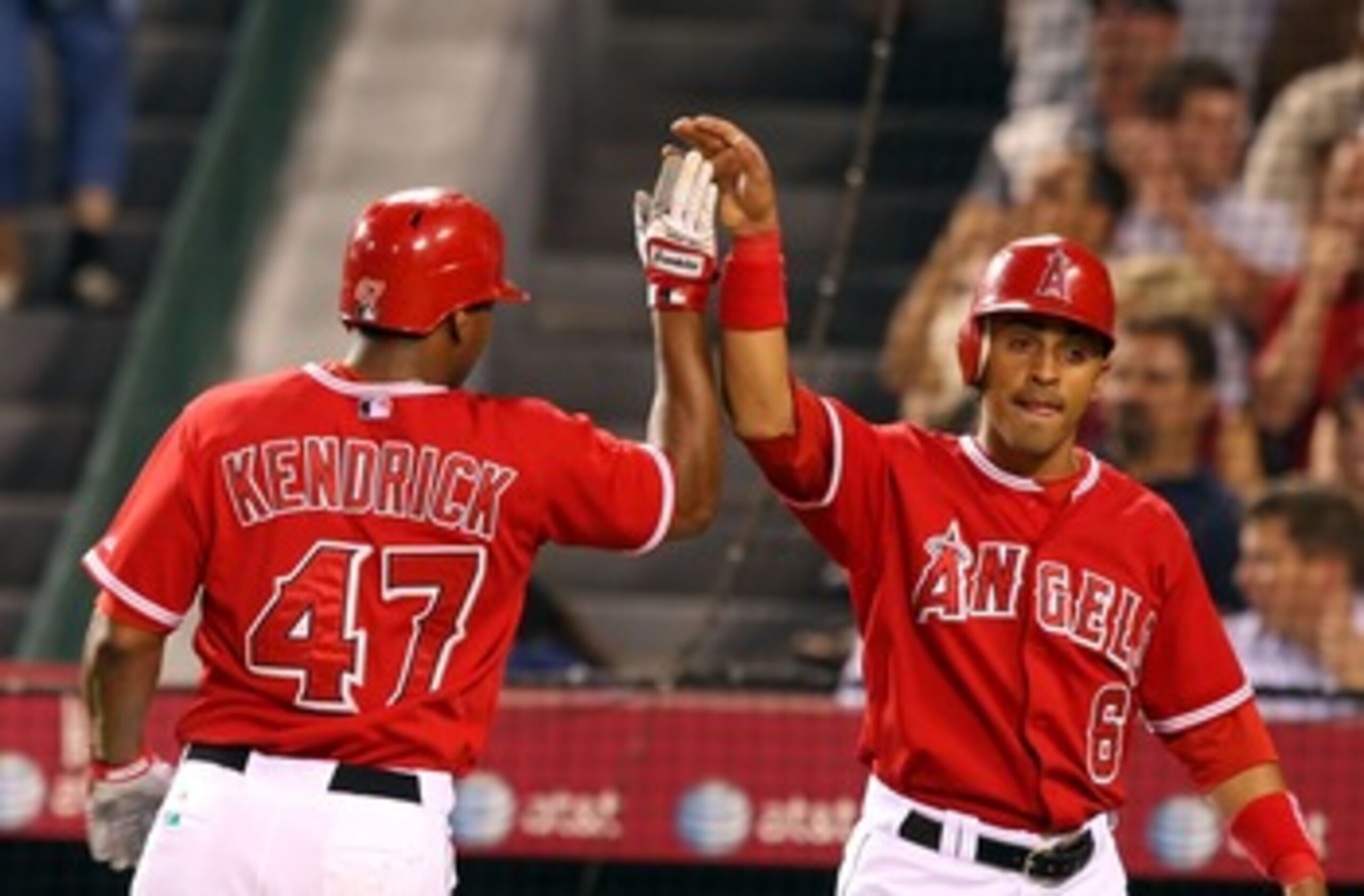 ANAHEIM, CA - AUGUST 21:  (L-R) Howie Kendrick #47 and Maicer Izturis #6 of the Los Angeles Angels of Anaheim celebrates after scoring in the second inning against the New York Yankees at Angels Stadium on August 21, 2007 in Anaheim, California.  (Photo b