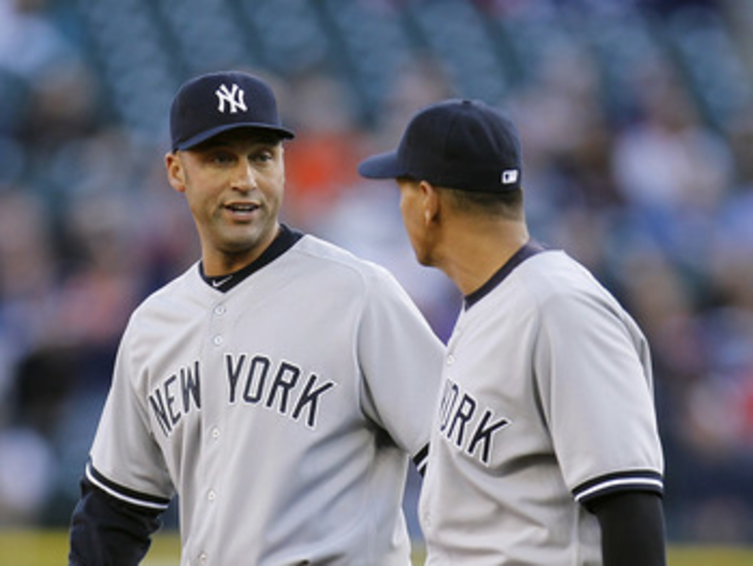 DETROIT, MI - MAY 04: Derek Jeter #2 of the New York Yankees talks with Alex Rodriguez #13 while playing the Detroit Tigers at Comerica Park on May 4, 2011 in Detroit, Michigan. Detroit won the game 4-0.(Photo by Gregory Shamus/Getty Images)
