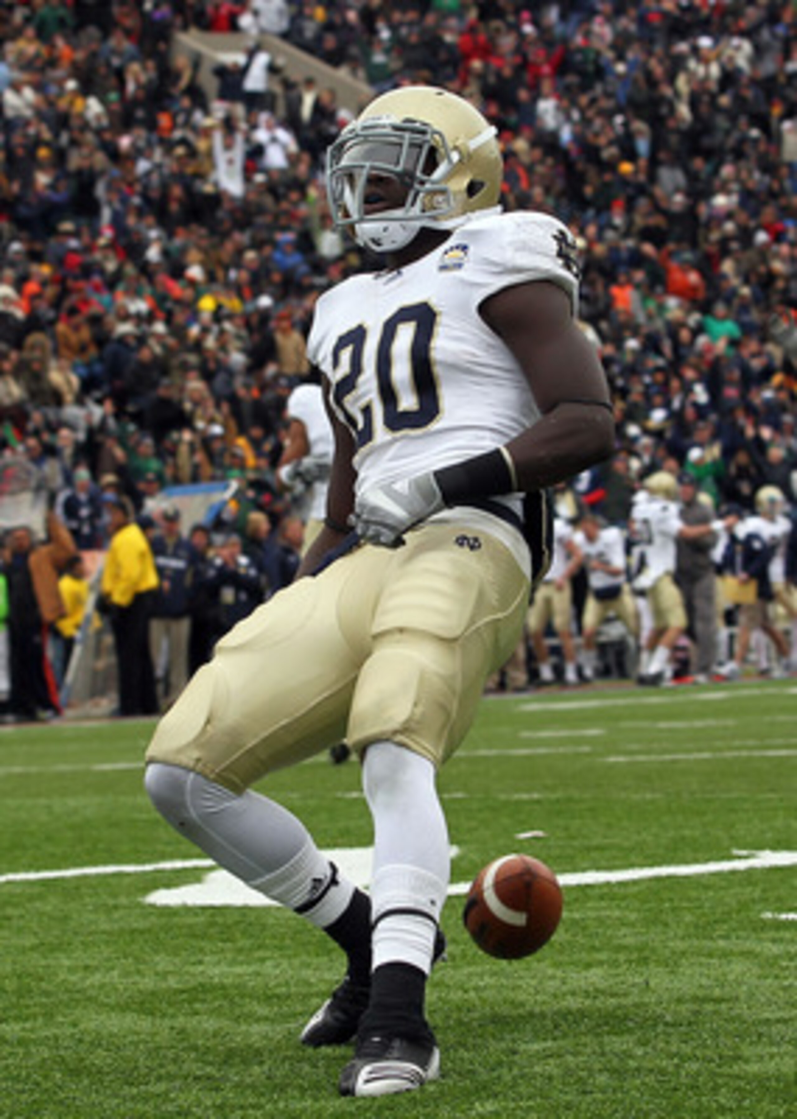 EL PASO, TX - DECEMBER 30: Running back Cierre Wood #20 of the Notre Dame Fighting Irish celebrates a touchdown against the Miami Hurricanes during the Hyundai Sun Bowl at Sun Bowl on December 30, 2010 in El Paso, Texas. (Photo by Ronald Martinez/Getty EL PASO, TX - DECEMBER 30: Running back Cierre Wood #20 of the Notre Dame Fighting Irish celebrates a touchdown against the Miami Hurricanes during the Hyundai Sun Bowl at Sun Bowl on December 30, 2010 in El Paso, Texas. (Photo by Ronald Martinez/Getty