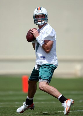 DAVIE, FL - MAY 02:  Rookie Quarterback Chad Henne #7 drops back to pass during Miami Dolphins Rookie Mini Camp on May 2, 2008 at the Dolphins practice facility in Davie, Florida.  (Photo by Marc Serota/Getty Images)