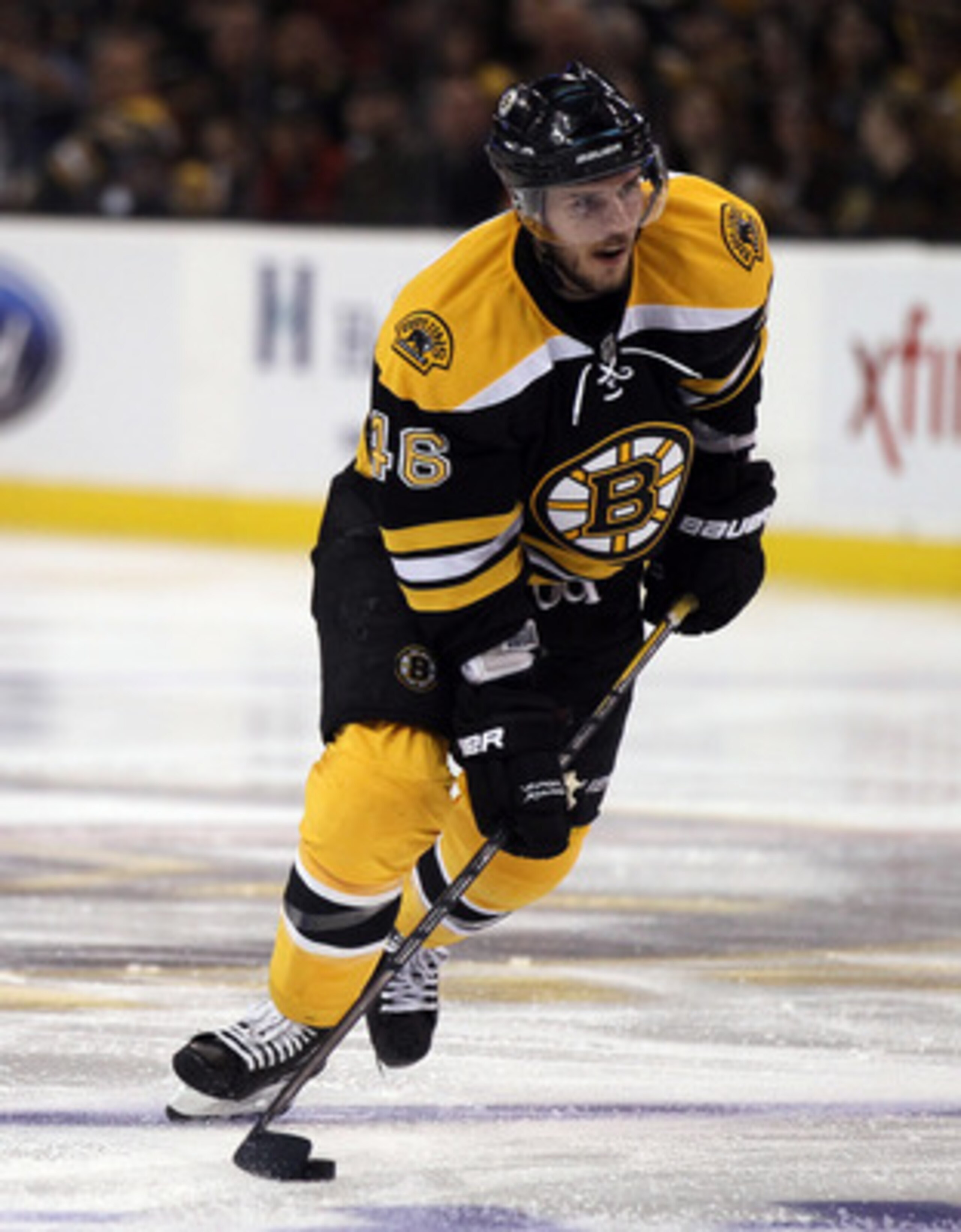 BOSTON, MA - MAY 06:  David Krejci #46 of the Boston Bruins takes the puck in the third period against the Philadelphia Flyers in Game Four of the Eastern Conference Semifinals during the 2011 NHL Stanley Cup Playoffs at TD Garden on May 6, 2011 in Boston