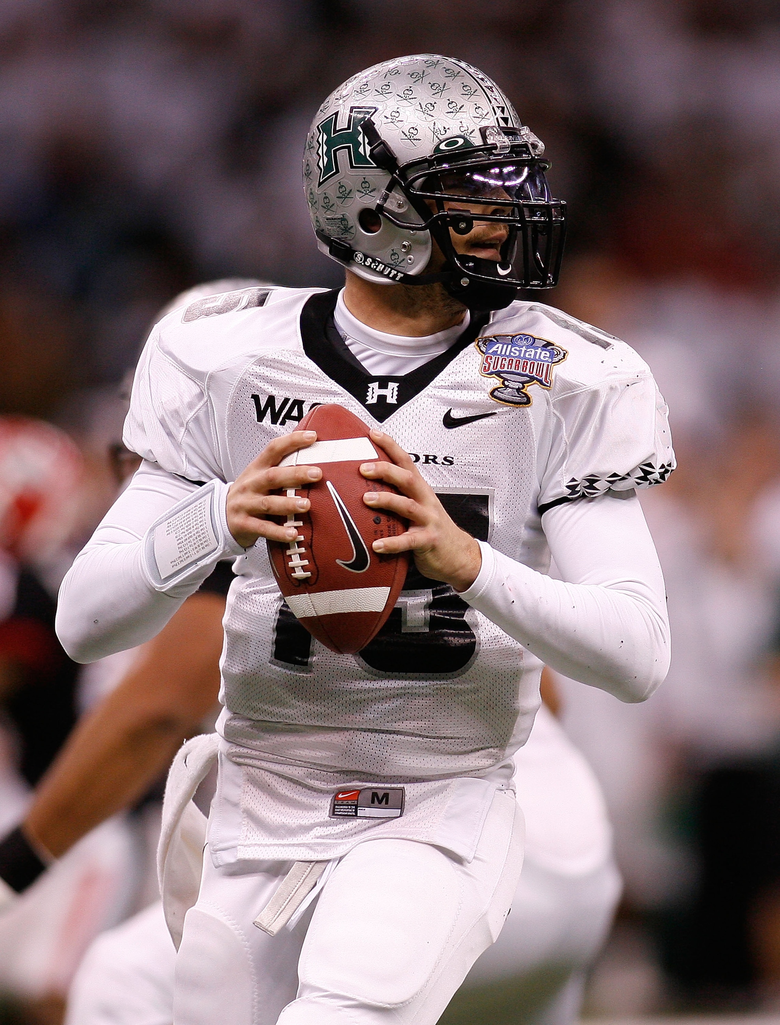 NEW ORLEANS - JANUARY 01:  Quarterback Colt Brennan #15 of the Hawai'i Warriors looks to pass against the Georgia Bulldogs during the Allstate Sugar Bowl at the Louisiana Superdome on January 1, 2008 in New Orleans, Louisiana.  (Photo by Chris Graythen/Ge