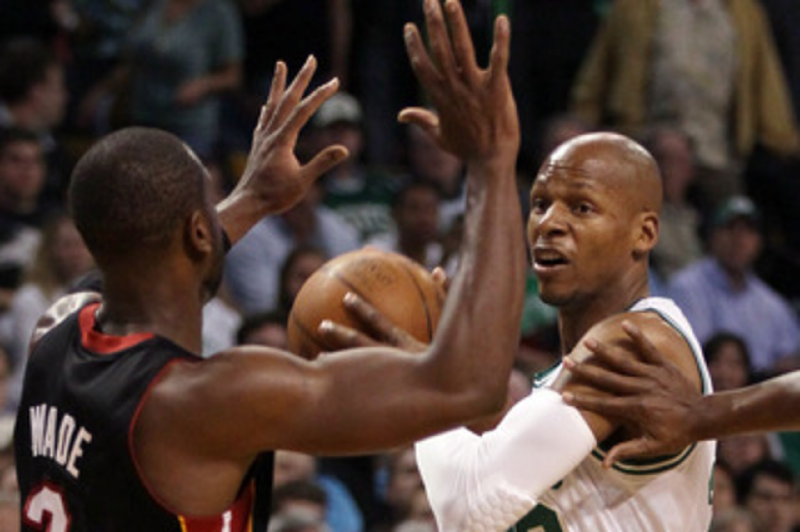 BOSTON, MA - MAY 09: Ray Allen #20 of the Boston Celtics looks ot pass around Dwyane Wade #3 of the Miami Heat in Game Four of the Eastern Conference Semifinals in the 2011 NBA Playoffs on May 9, 2011 at the TD Garden in Boston, Massachusetts.  NOTE TO US