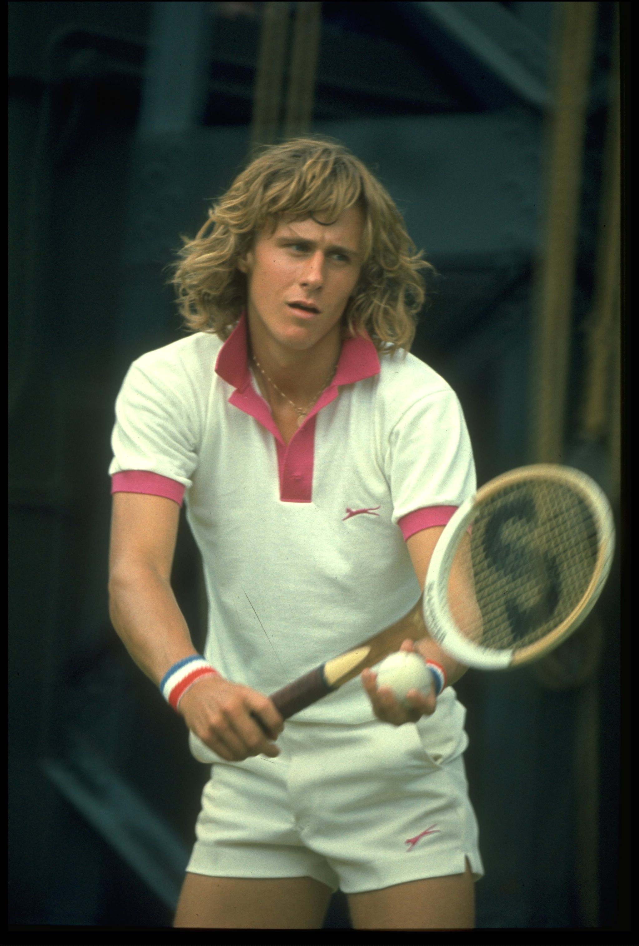 JUN 1974:  BJORN BORG OF SWEDEN PREPARES TO MAKE A SERVE DURING A MATCH AT THE 1974 WIMBLEDON TENNIS CHAMPIONSHIPS.