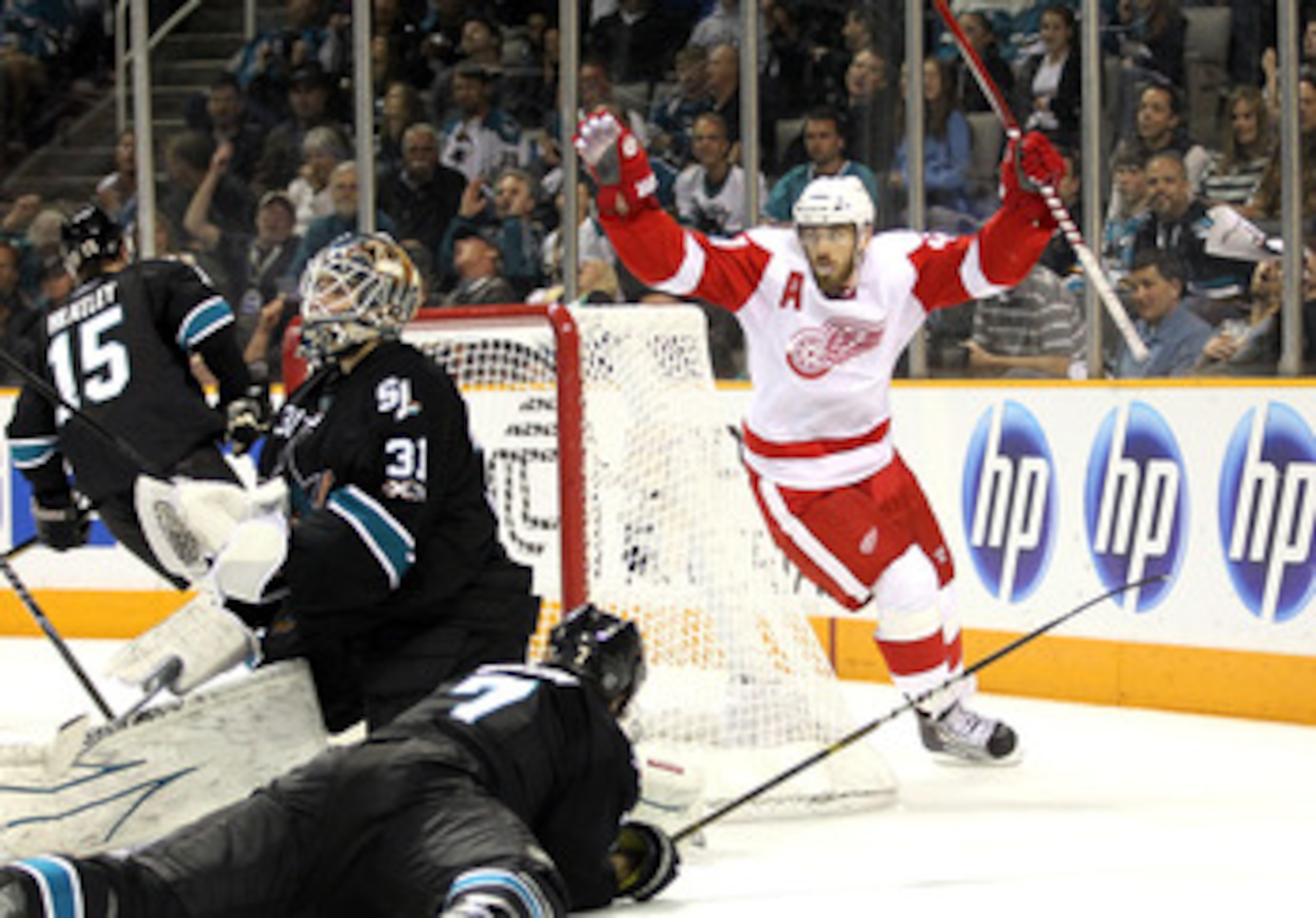 SAN JOSE, CA - MAY 08:  Henrik Zetterberg #40 of the Detroit Red Wings celebrates after his teammate Niklas Kronwall scored a goal against Antti Niemi #31 of the San Jose Sharks in Game Five of the Western Conference Semifinals during the 2011 NHL Stanley