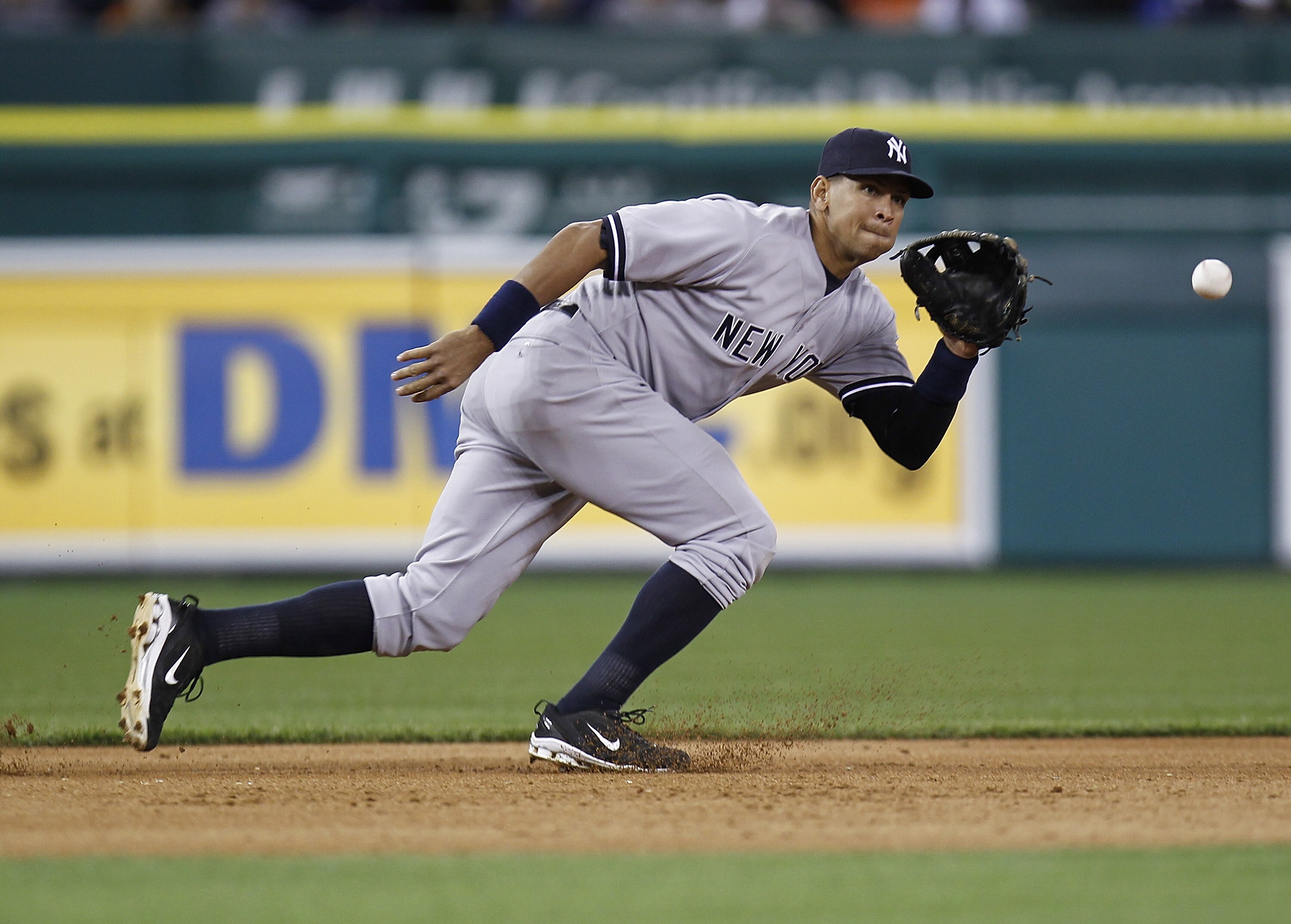 DETROIT, MI - MAY 02:  Alex Rodriguez #13 of the New York Yankees fields a ground ball while playing the Detroit Tigers at Comerica Park on May 2, 2011 in Detroit, Michigan. New York won the game 5-3. (Photo by Gregory Shamus/Getty Images)