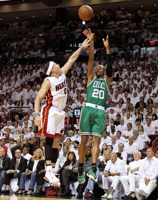 MIAMI, FL - MAY 03:  Ray Allen #20 of the Boston Celtics takes a shot against Mike Bibby #0 of  the Miami Heat during Game Two of the Eastern Conference Semifinals of the 2011 NBA Playoffs at American Airlines Arena on May 3, 2011 in Miami, Florida. NOTE