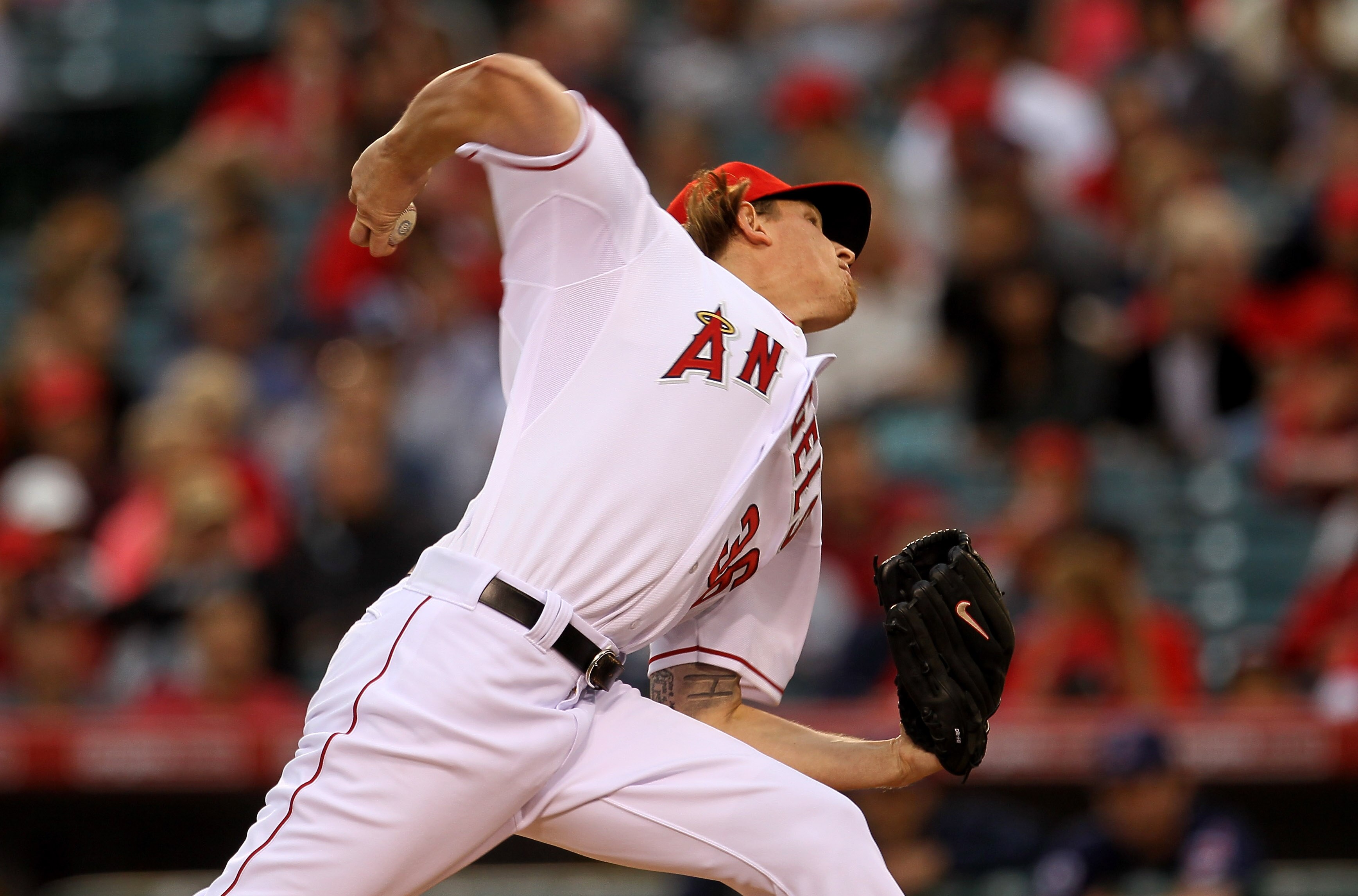 ANAHEIM, CA - MAY 07:  Jered Weaver #36 of the Los Angeles Angels of Anaheim throws a pitch against the Cleveland Indians on May 7, 2011 at Angel Stadium in Anaheim, California.  (Photo by Stephen Dunn/Getty Images)