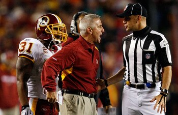 LANDOVER, MD - OCTOBER 26:  Special teams coach Danny Smith of the Washington Redskins argues with a referee during the game against the Philadelphia Eagles at FedEx Field October 26, 2009 in Landover, Maryland. The Eagles won the game 27-17.  (Photo by W