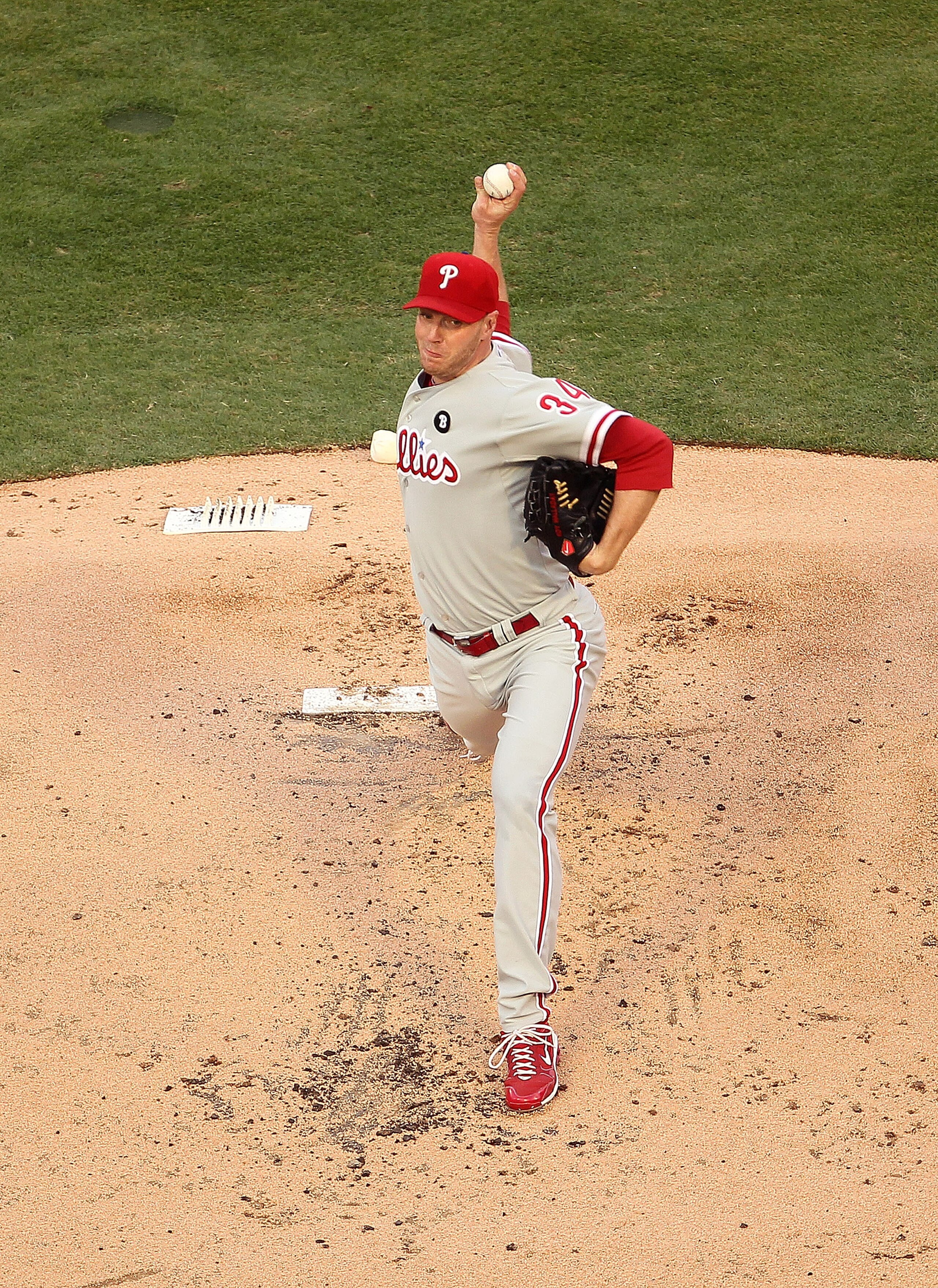 MIAMI GARDENS, FL - MAY 10:  Roy Halladay #34 of the Philadelphia Phillies pitches during a game against the Florida Marlins at Sun Life Stadium on May 10, 2011 in Miami Gardens, Florida.  (Photo by Mike Ehrmann/Getty Images)