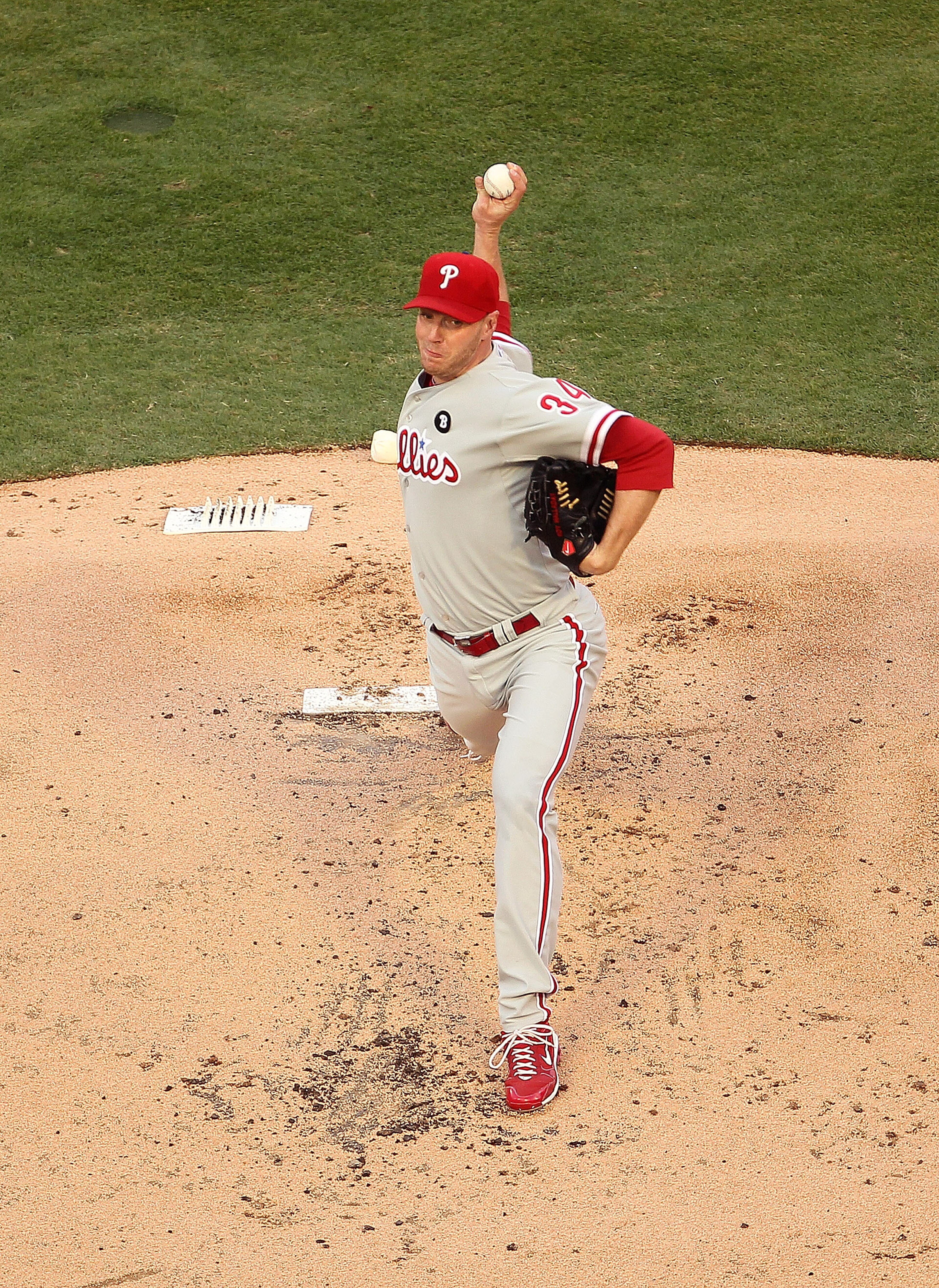 MIAMI GARDENS, FL - MAY 10:  Roy Halladay #34 of the Philadelphia Phillies pitches during a game against the Florida Marlins at Sun Life Stadium on May 10, 2011 in Miami Gardens, Florida.  (Photo by Mike Ehrmann/Getty Images)