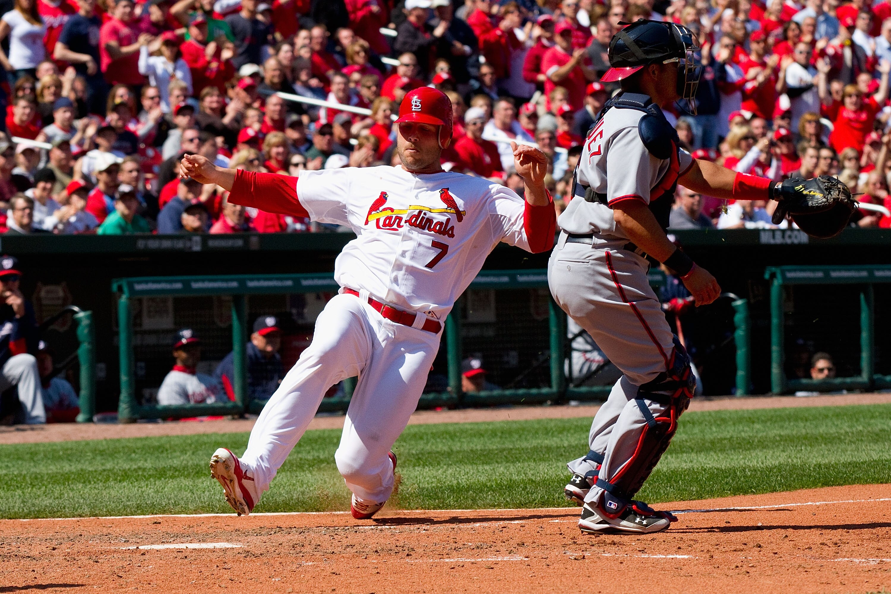 ST. LOUIS, MO - APRIL 21: Matt Holliday #7 of the St. Louis Cardinals scores a run against the Washington Nationals at Busch Stadium on April 21, 2011 in St. Louis, Missouri.  (Photo by Dilip Vishwanat/Getty Images)