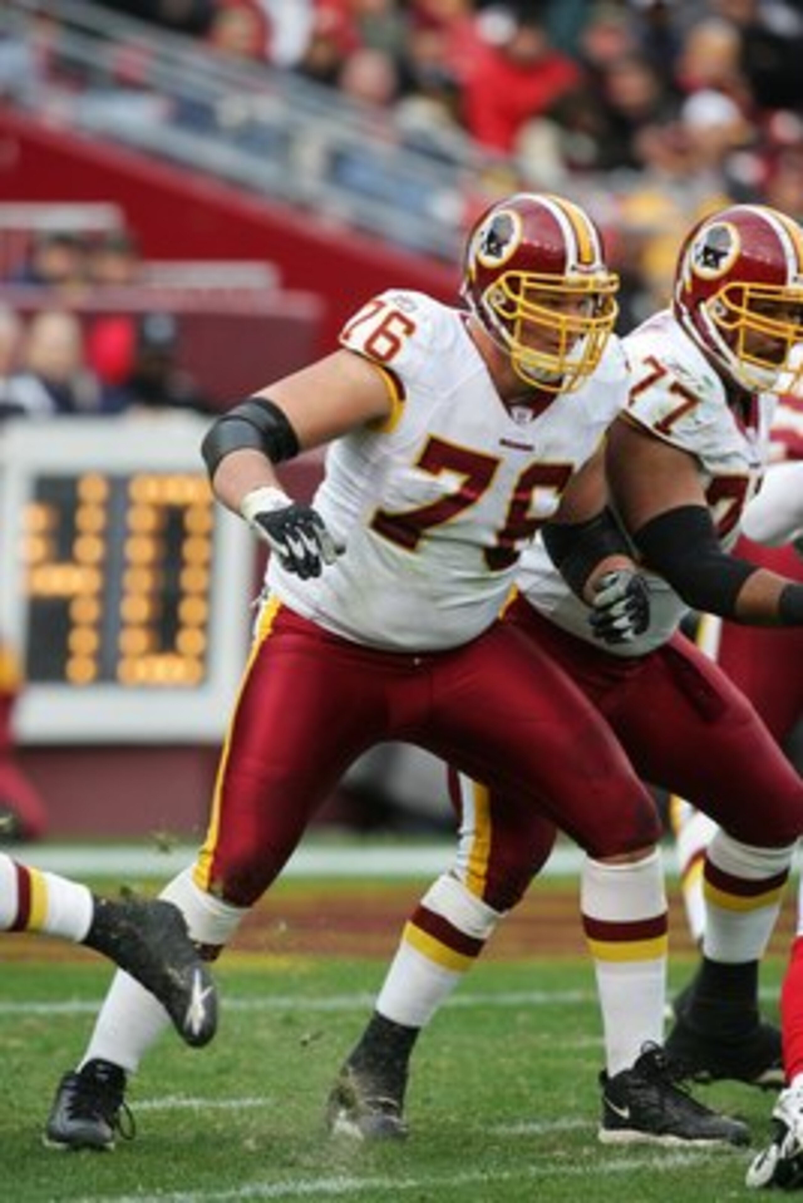 LANDOVER, MD - DECEMBER 3:  Offensive tackle Jon Jansen #76 of the Washington Redskins blocks against the Atlanta Falcons on December 3, 2006 at FedExField in Landover, Maryland. The Falcons defeated the Redskins 24-14. (Photo by Jim McIsaac/Getty Images)