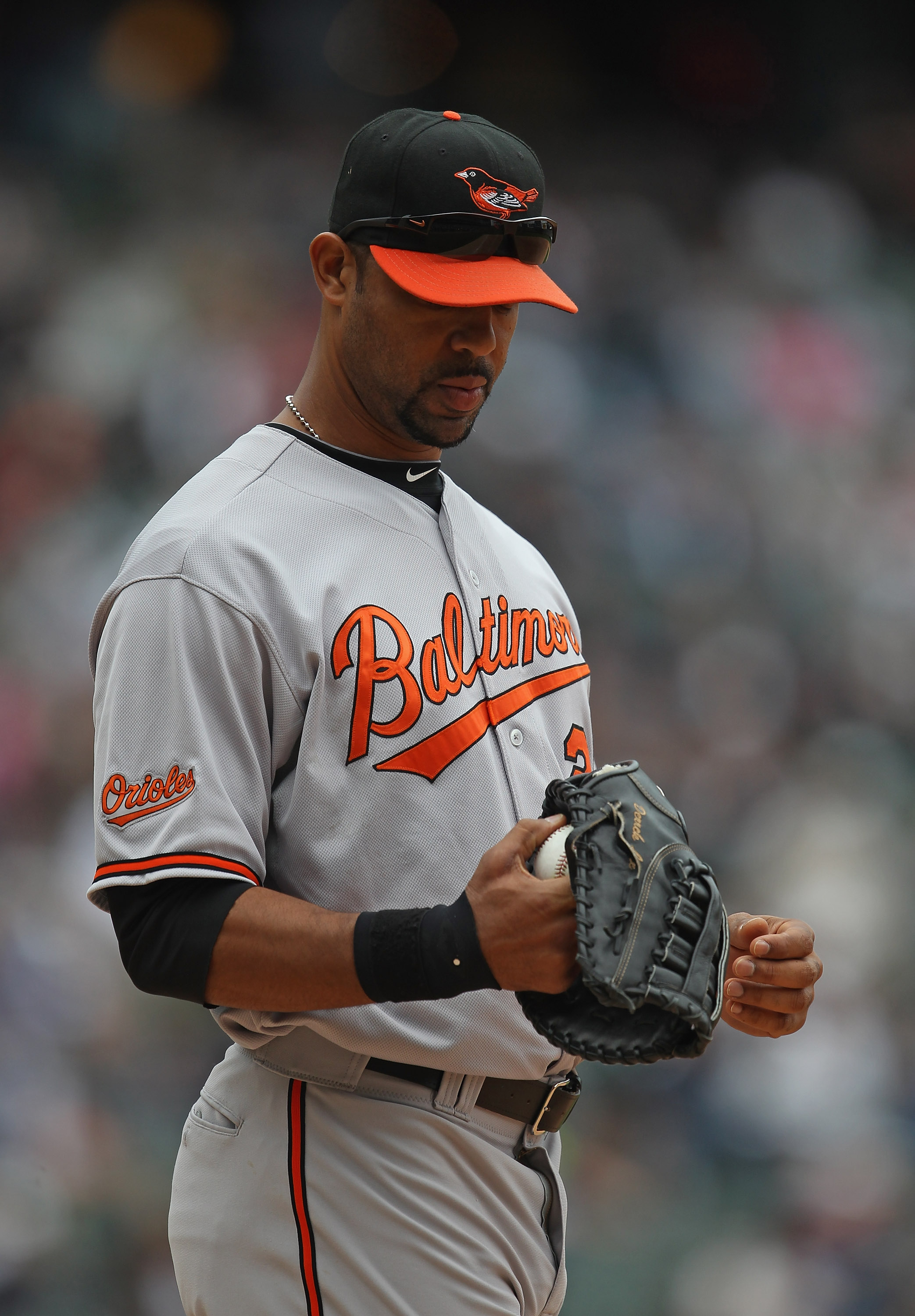 CHICAGO, IL - MAY 01: Derrek Lee #25 of the Baltimore Orioles waits to warm-up before the start of an inning against the Chicago White Sox at U.S. Cellular Field on May 1, 2011 in Chicago, Illinois. The Orioles defeated the White Sox 6-4. (Photo by Jonath