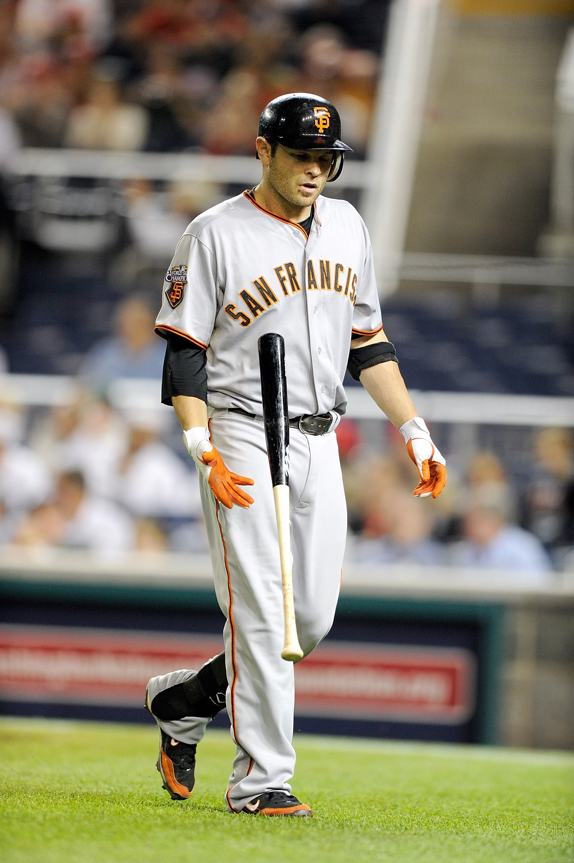 WASHINGTON, DC - MAY 02: Freddy Sanchez #21 of the San Francisco Giants flips his bat after striking out in the ninth inning against the Washington Nationals at Nationals Park on May 2, 2011 in Washington, DC.  (Photo by Greg Fiume/Getty Images)