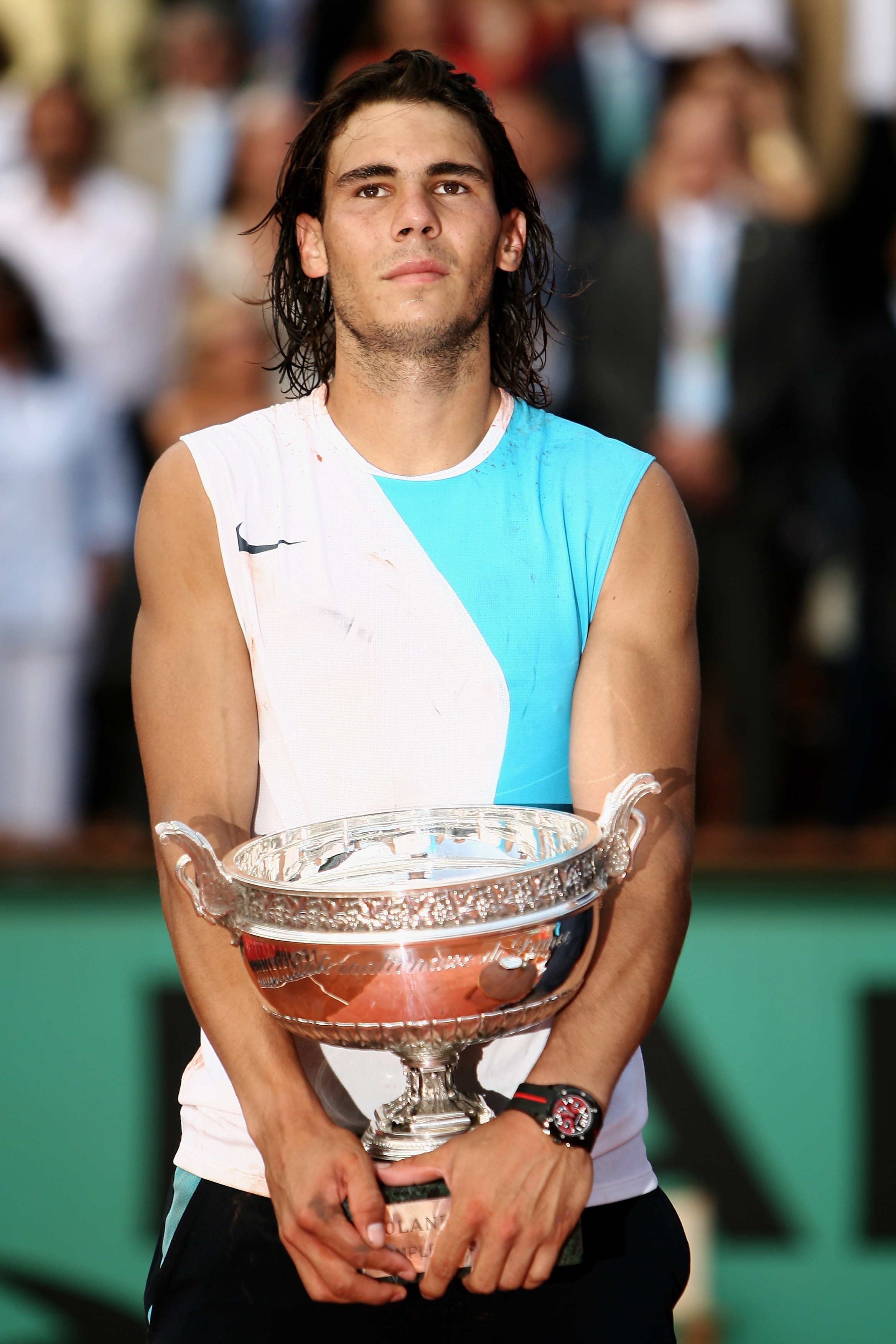 PARIS - JUNE 10:  Rafael Nadal of Spain poses with the Philippe Chatrier Trophy after winning against Roger Federer of Switzerland in the Men's Singles Final on day fifteen of the French Open at Roland Garros on June 10, 2007 in Paris, France.  (Photo by