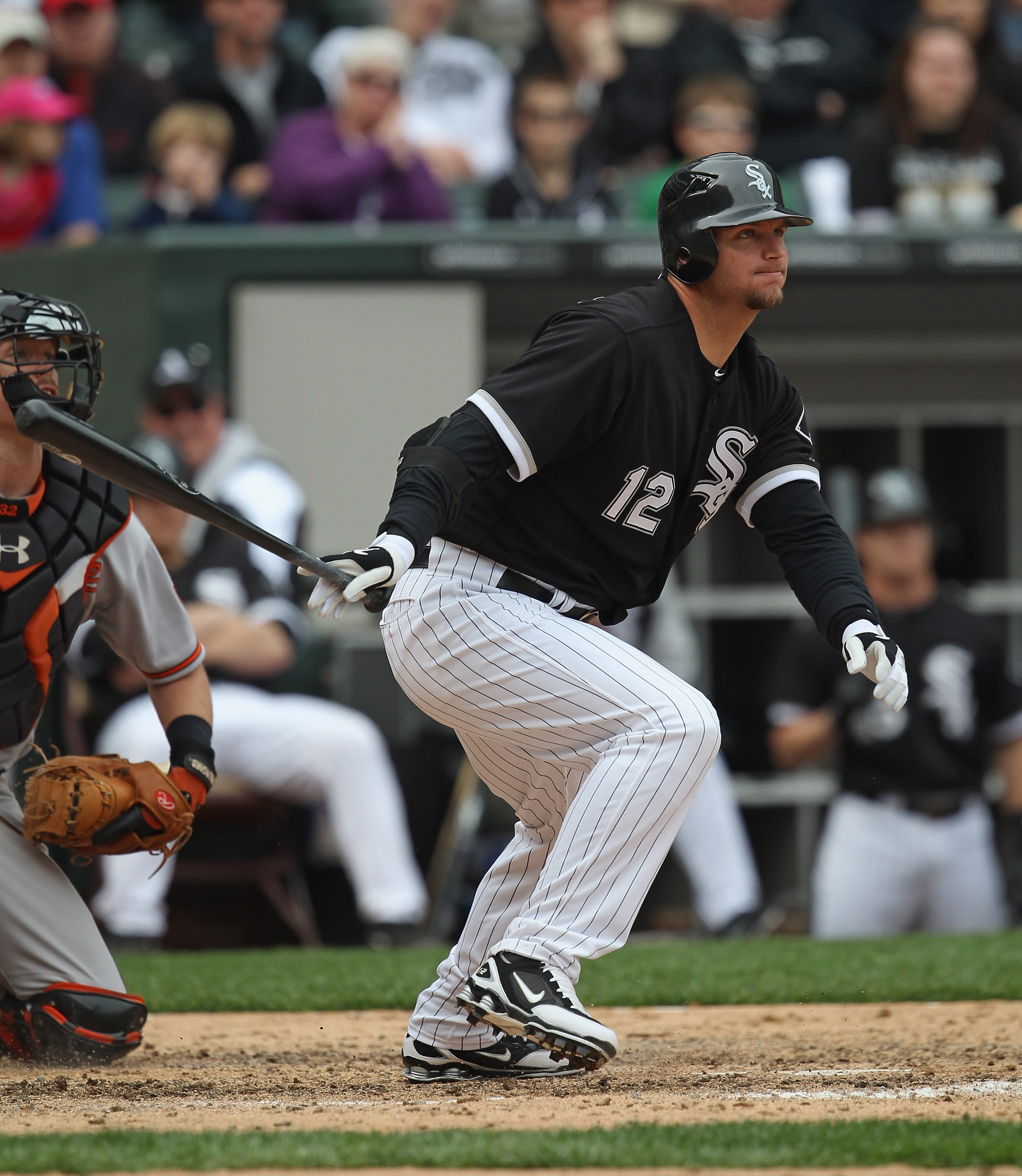 CHICAGO, IL - MAY 01: A.J. Pierzynski #12 of the Chicago White Sox hits the ball against the Baltimore Orioles at U.S. Cellular Field on May 1, 2011 in Chicago, Illinois. The Orioles defeated the White Sox 6-4. (Photo by Jonathan Daniel/Getty Images)