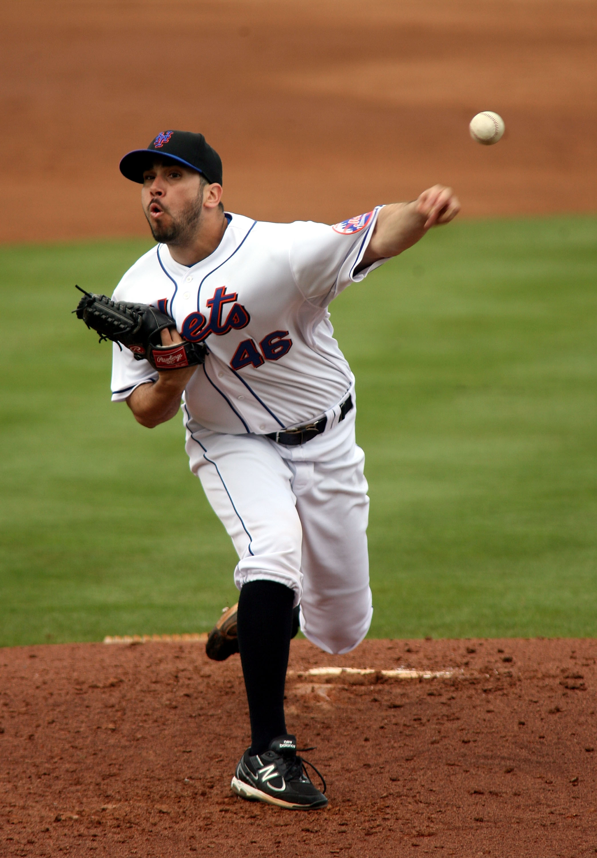 PORT ST. LUCIE, FL - MARCH 03:  Pitcher Oliver Perez #46 of the New York Mets throws against the St. Louis Cardinals at Digital Domain Park on March 3, 2011 in Port St. Lucie, Florida.  (Photo by Marc Serota/Getty Images)