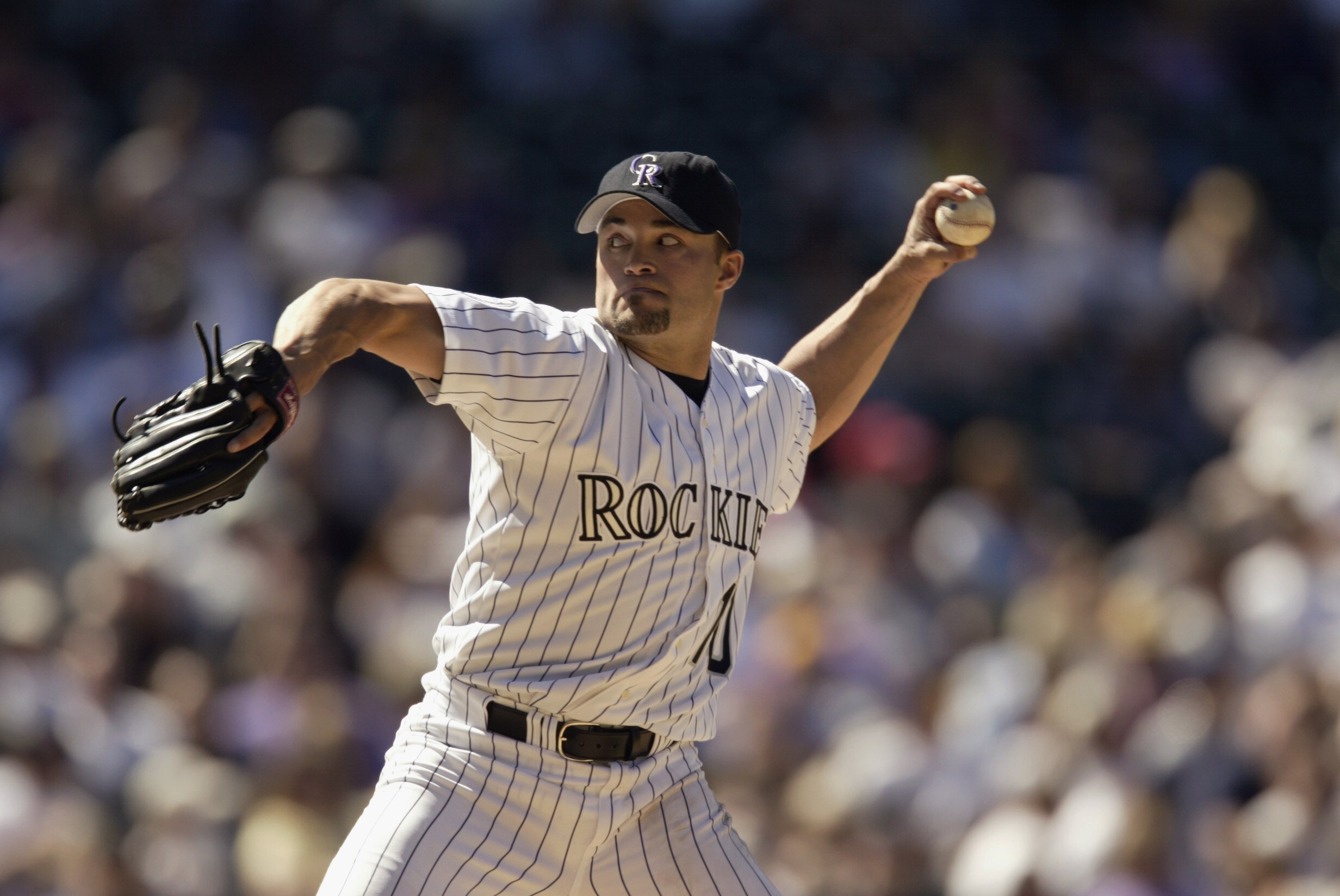 DENVER - APRIL 17:  Mike Hampton #10 of the Colorado Rockies pitches against the Los Angeles Dodgers during the game at Coors Field in Denver, Colorado on April 17, 2002. The Dodgers won 6-3. (Photo by Brian Bahr/Getty Images)