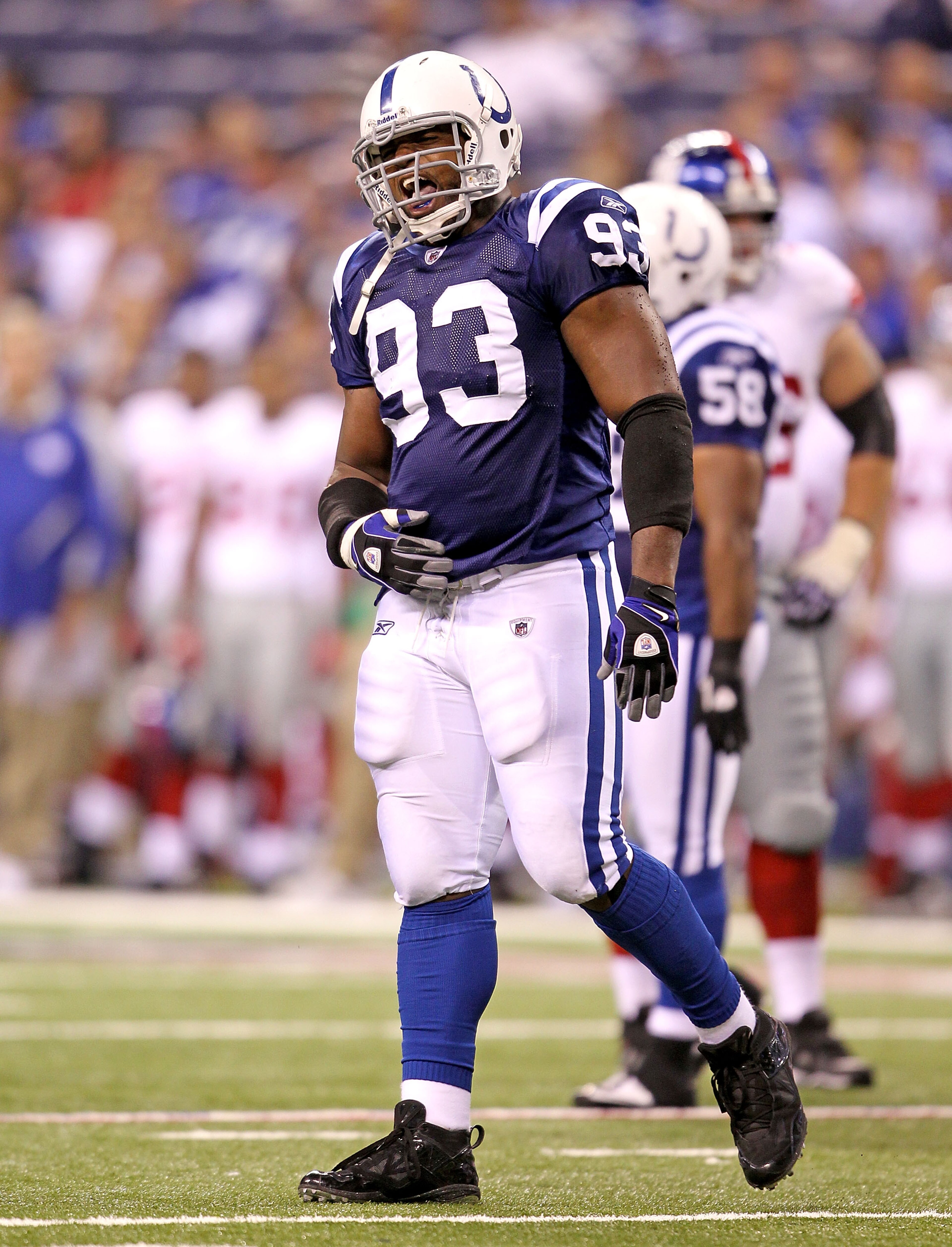 INDIANAPOLIS - SEPTEMBER 19: Dwight Freeney #93 of the Indianapolis Colts celebrates after a sack during the NFL game against the New York Giants at Lucas Oil Stadium on September 19, 2010 in Indianapolis, Indiana. (Photo by Andy Lyons/Getty Images) INDIANAPOLIS - SEPTEMBER 19: Dwight Freeney #93 of the Indianapolis Colts celebrates after a sack during the NFL game against the New York Giants at Lucas Oil Stadium on September 19, 2010 in Indianapolis, Indiana. (Photo by Andy Lyons/Getty Images)