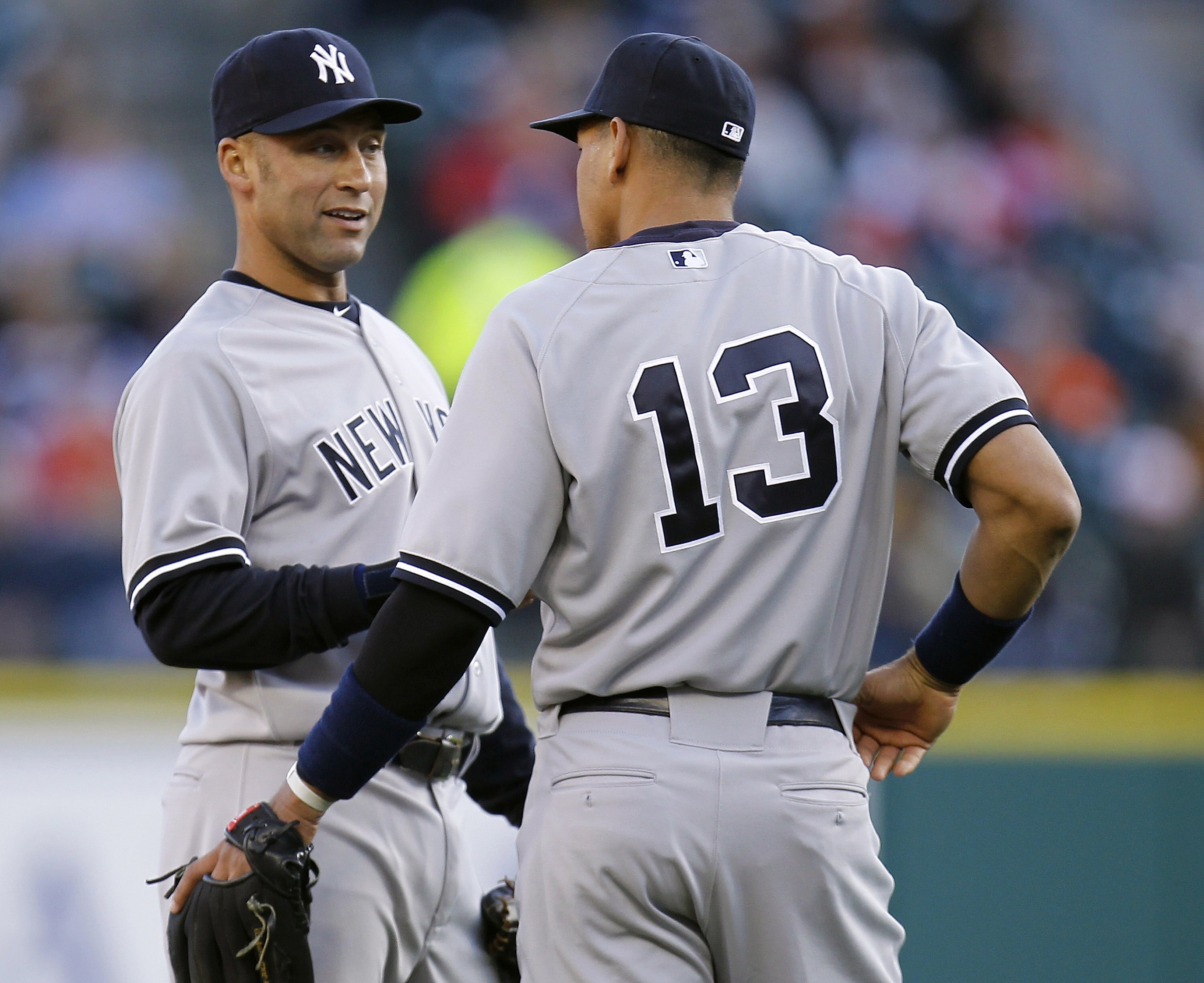 DETROIT, MI - MAY 04: Derek Jeter #2 of the New York Yankees talks with Alex Rodriguez #13 while playing the Detroit Tigers at Comerica Park on May 4, 2011 in Detroit, Michigan. Detroit won the game 4-0.(Photo by Gregory Shamus/Getty Images)