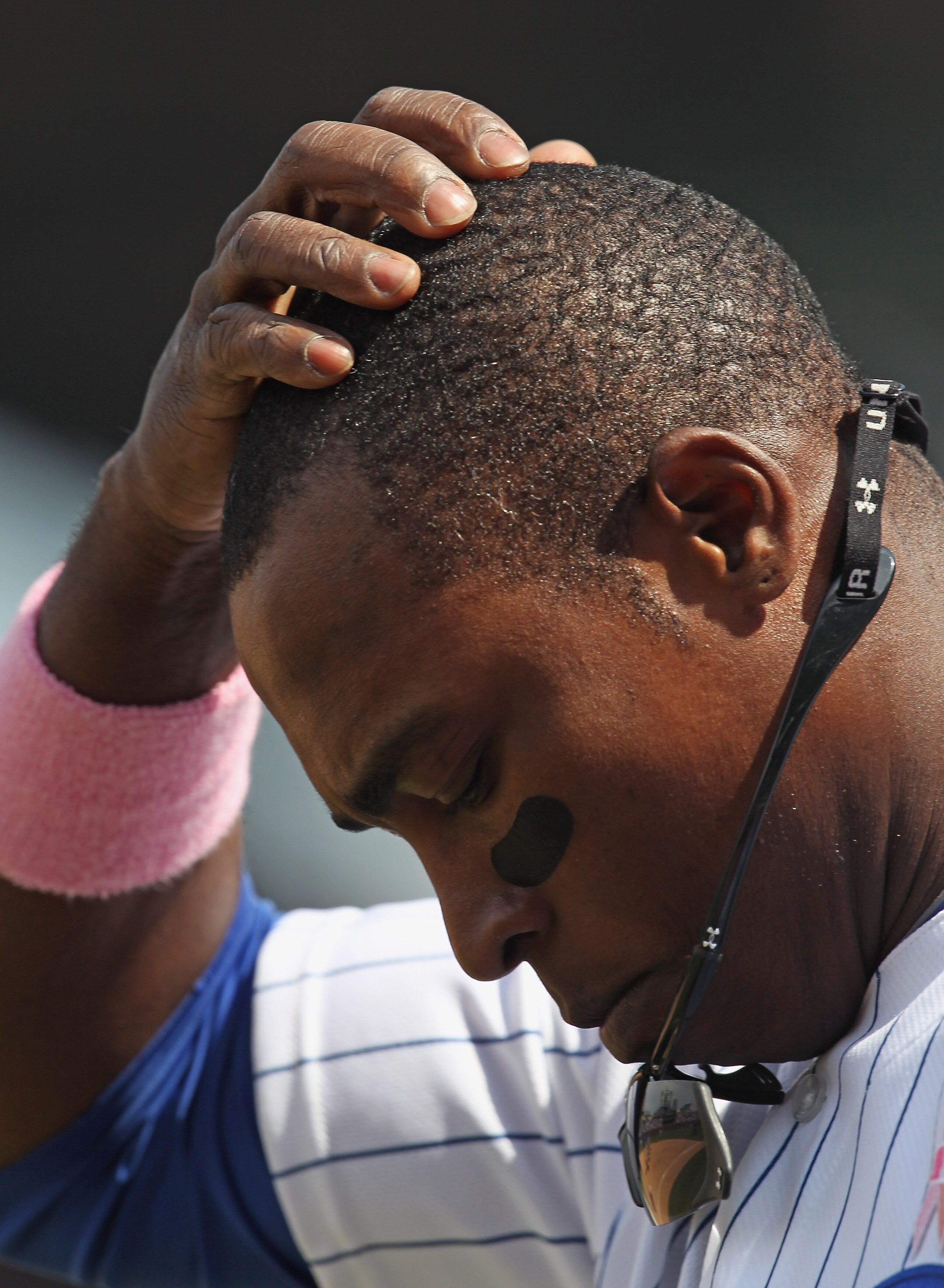 CHICAGO, IL - MAY 08: Alfonso Soriano #12 of the Chicago Cubs walks to the outfield against the Cincinnati Reds at Wrigley Field on May 8, 2011 in Chicago, Illinois. The Reds defeated the Cubs 2-0.  (Photo by Jonathan Daniel/Getty Images)