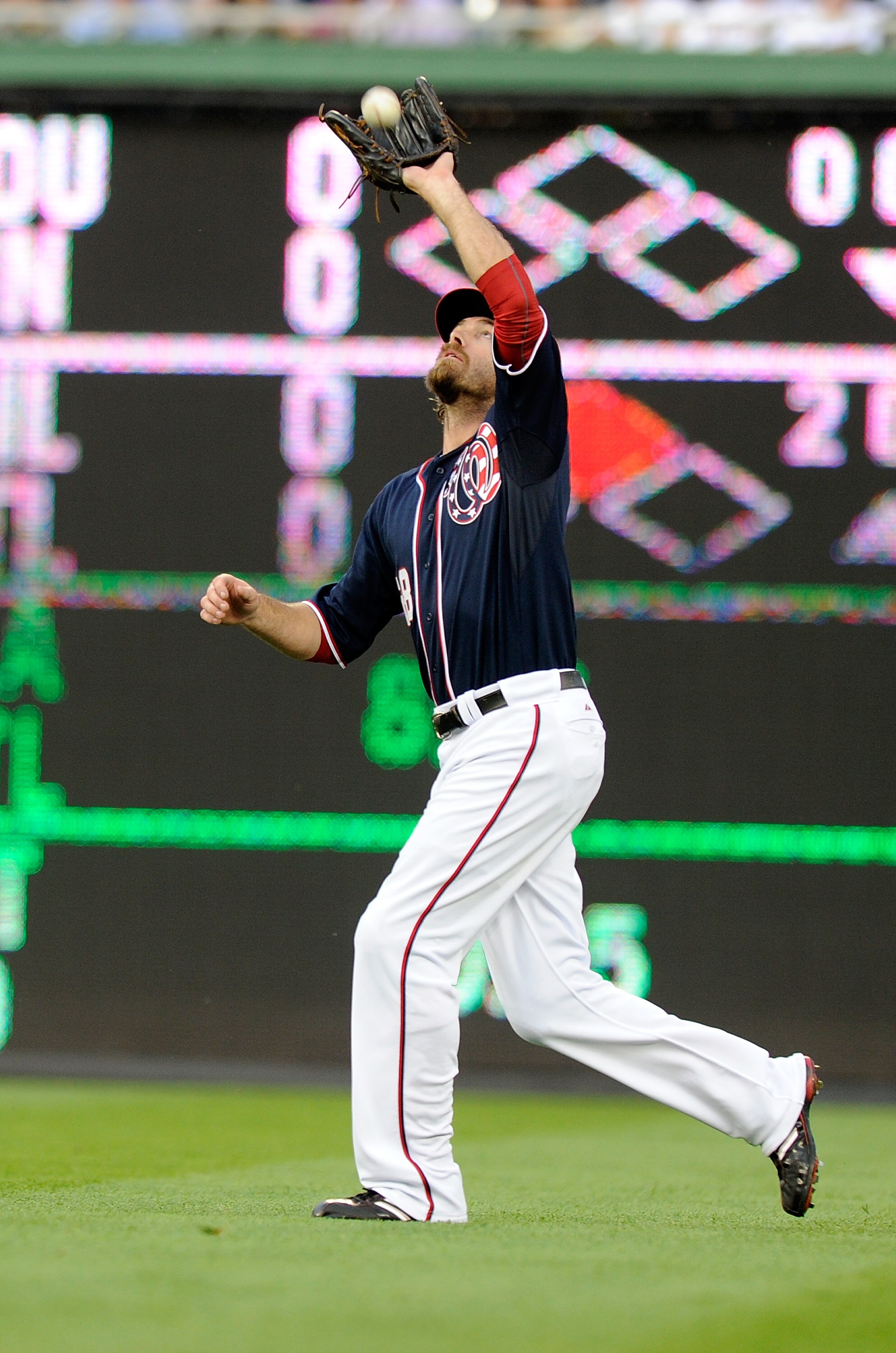 WASHINGTON, DC - MAY 02:  Jayson Werth #28 of the Washington Nationals catches a fly ball during the game against the San Francisco Giants at Nationals Park on May 2, 2011 in Washington, DC.  (Photo by Greg Fiume/Getty Images)