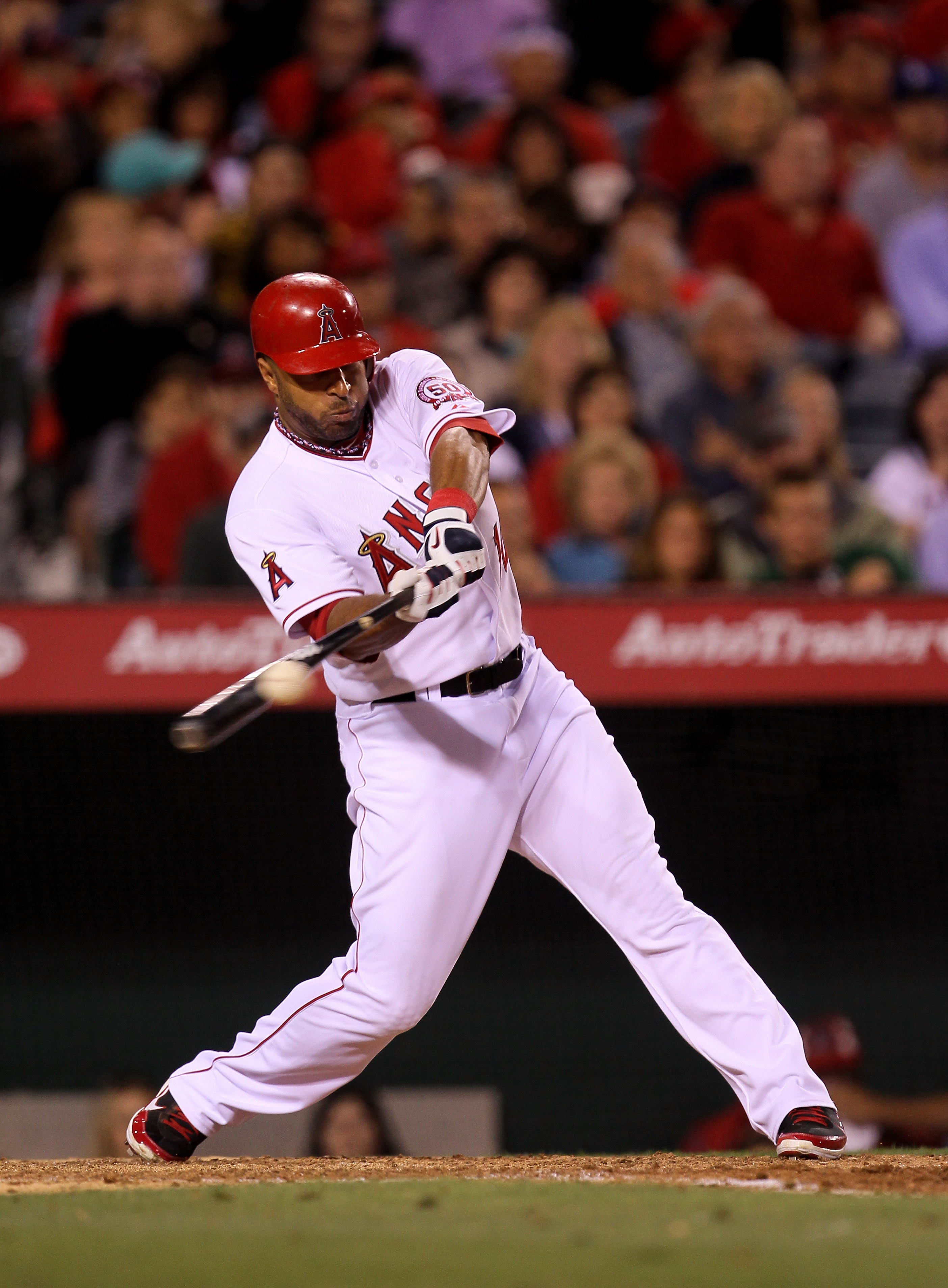 ANAHEIM, CA - MAY 7:   Vernon Wells #10 of the Los Angeles Angels of Anaheim picks up an RBI in the sixth inning with a sacrifice fly against the Cleveland Indians on May 7, 2011 at Angel Stadium in Anaheim, California.    (Photo by Stephen Dunn/Getty Ima