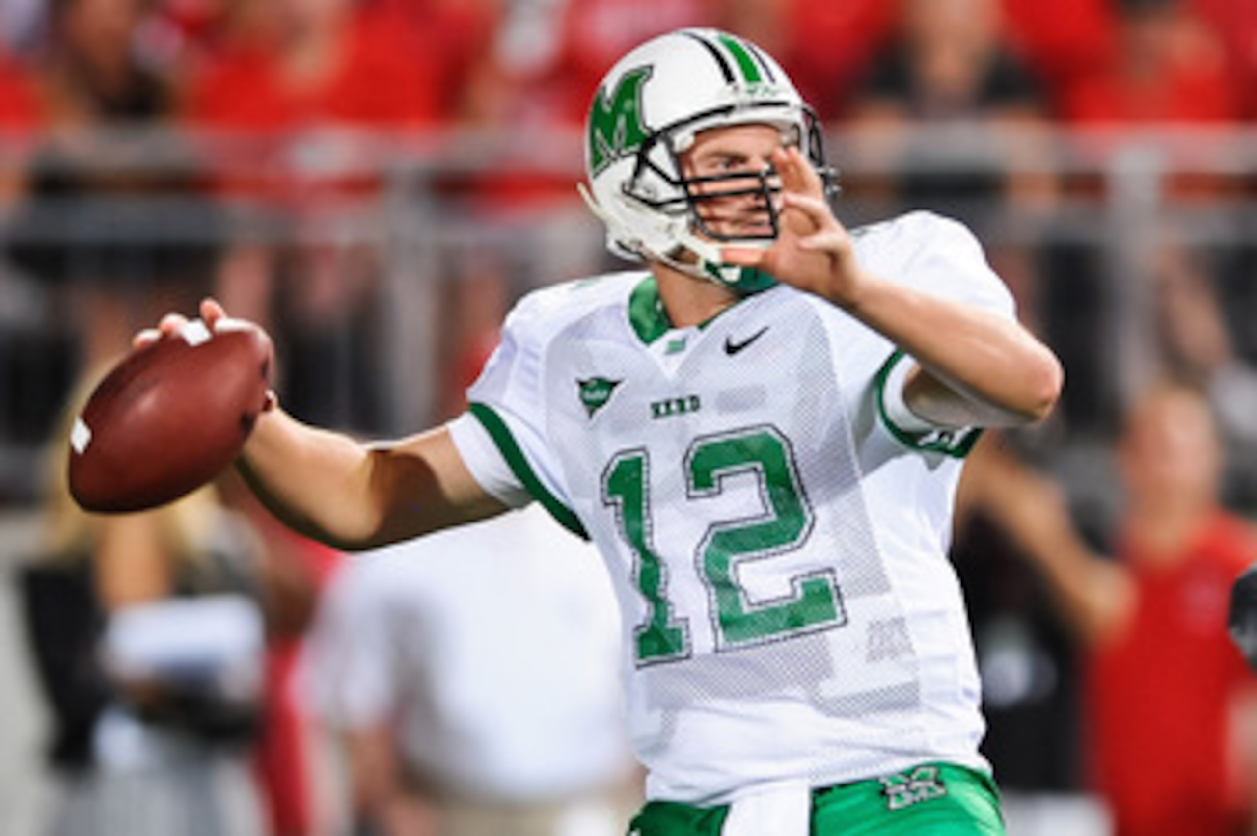 COLUMBUS, OH - SEPTEMBER 2: Quarterback Brian Anderson #12 of the Marshall Thundering Herd passes against the Ohio State Buckeyes at Ohio Stadium on September 2, 2010 in Columbus, Ohio. (Photo by Jamie Sabau/Getty Images)