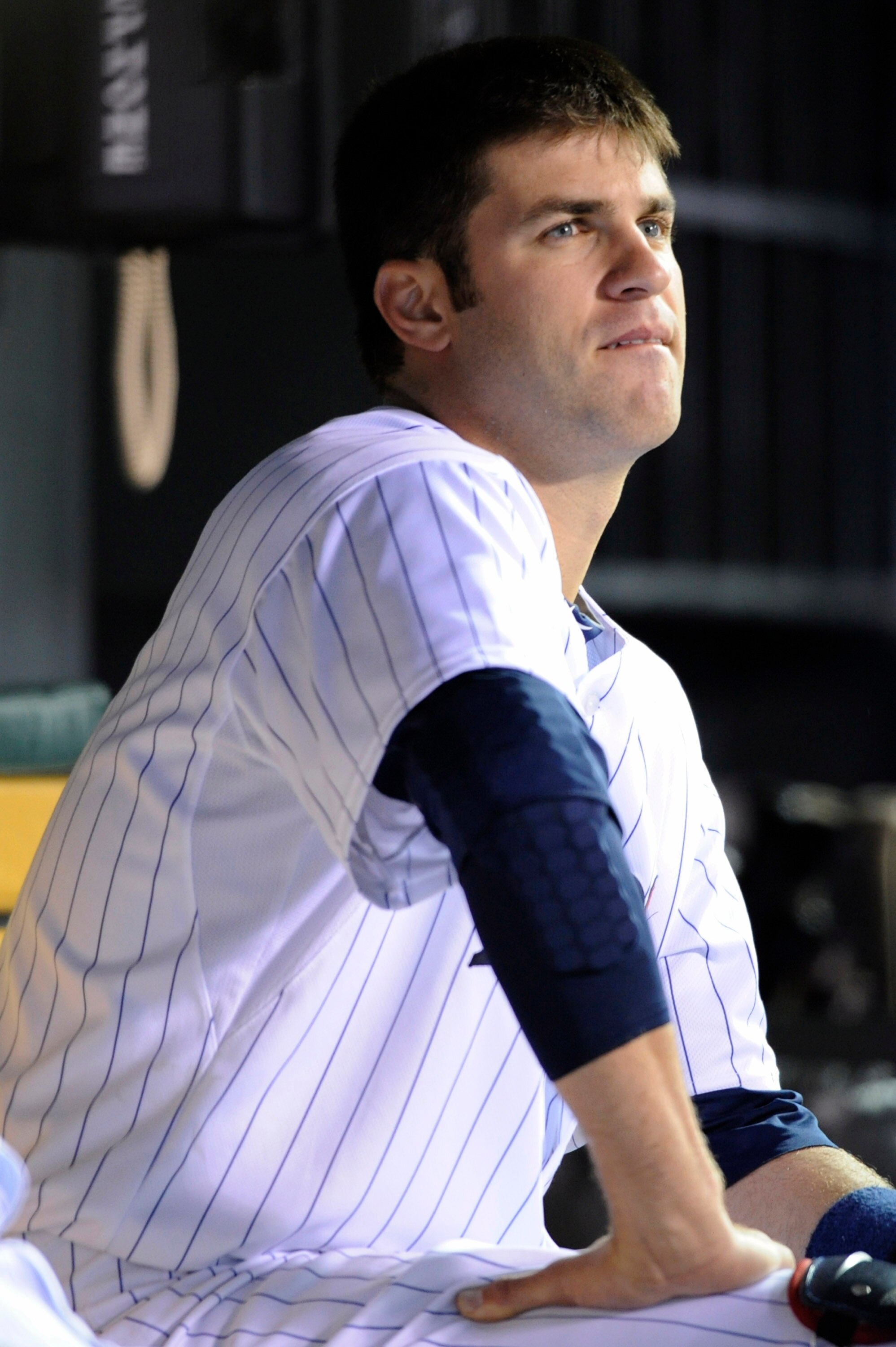 MINNEAPOLIS, MN - APRIL 9: Joe Mauer #7 of the Minnesota Twins in the dugout during the seventh inning of their game against the Oakland Athletics on April 9, 2011 at Target Field in Minneapolis, Minnesota. Athletics defeated the Twins 1-0. (Photo by Hann