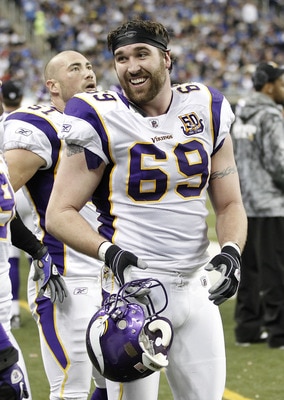DETROIT, MI - JANUARY 02:  Jared Allen #69 of the Minnesota Vikings smiles on the bench after returning an interception for a touchdown while playing the Detroit Lions at Ford Field on January 2, 2011 in Detroit, Michigan. Detroit won the game 20-13.  (Ph