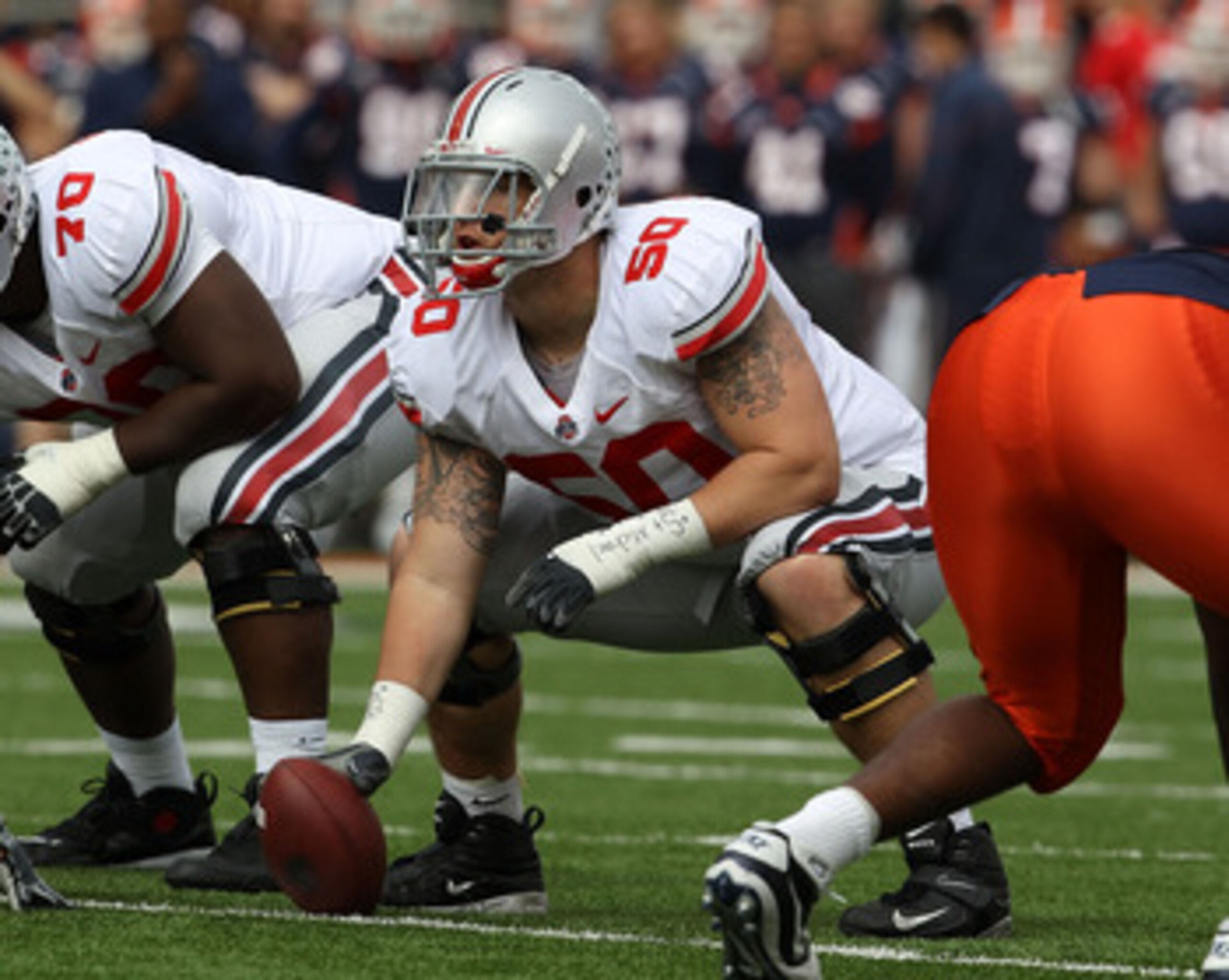 CHAMPAIGN, IL - OCTOBER 02: Mike Brewster #50 of the Ohio State Buckeyes waits to snap the ball against the Illinois Fighting Illini at Memorial Stadium on October 2, 2010 in Champaign, Illinois. Ohio State defeated Illinois 24-13. (Photo by Jonathan Dan CHAMPAIGN, IL - OCTOBER 02: Mike Brewster #50 of the Ohio State Buckeyes waits to snap the ball against the Illinois Fighting Illini at Memorial Stadium on October 2, 2010 in Champaign, Illinois. Ohio State defeated Illinois 24-13. (Photo by Jonathan Dan