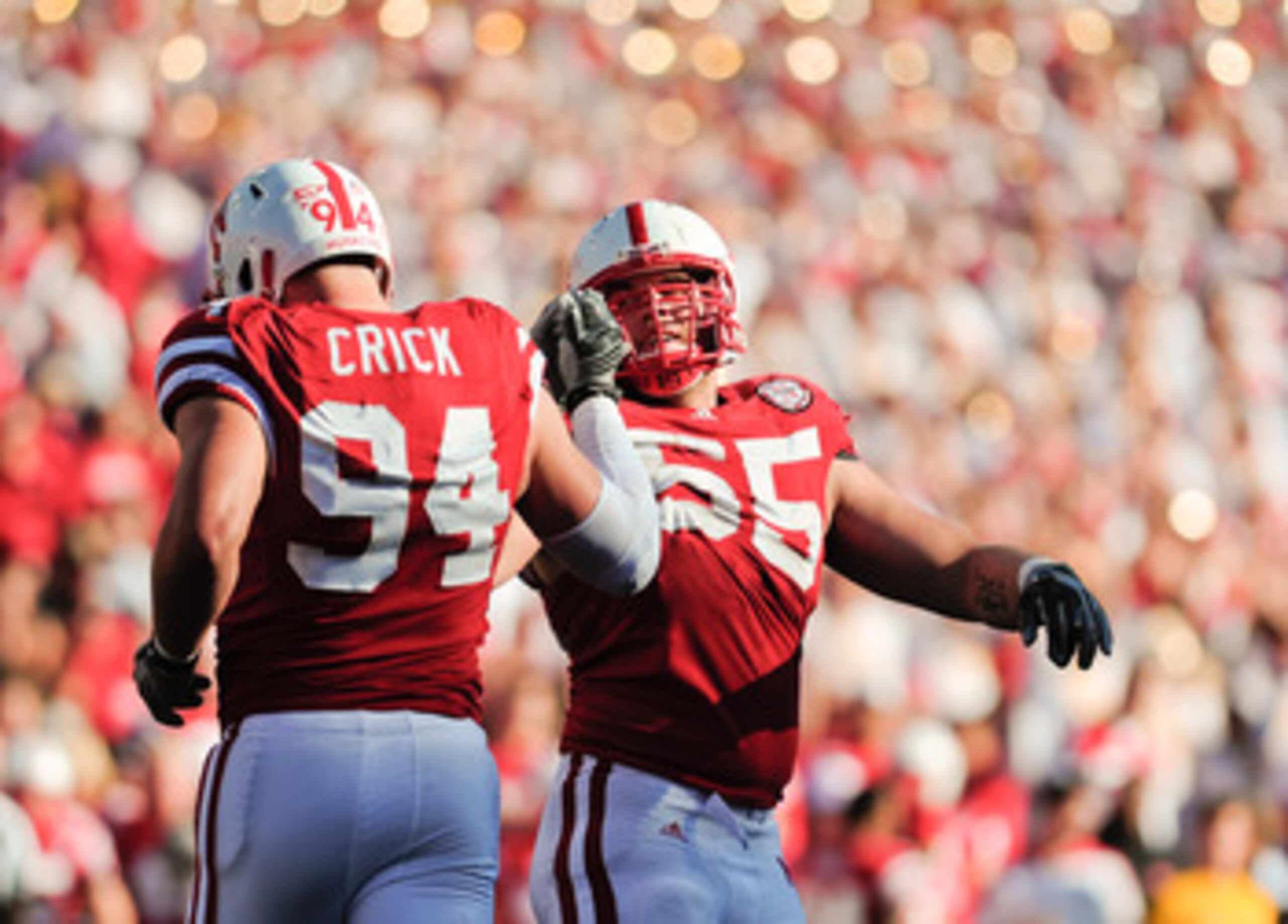 LINCOLN, NE - OCTOBER 30: Defensive tackle Baker Steinkuhler #55 of the Nebraska Cornhuskers high fives teammate defensive tackle Jared Crick #94 after a third down stop during second half action of their game at Memorial Stadium on October 30, 2010 in LINCOLN, NE - OCTOBER 30: Defensive tackle Baker Steinkuhler #55 of the Nebraska Cornhuskers high fives teammate defensive tackle Jared Crick #94 after a third down stop during second half action of their game at Memorial Stadium on October 30, 2010 in