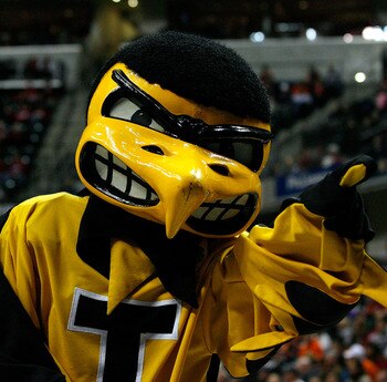 INDIANAPOLIS, IN - MARCH 10: Herky the hawk, mascot for the Iowa Hawkeyes performs against the Michigan State Spartans during the first round of the 2011 Big Ten Men's Basketball Tournament at Conseco Fieldhouse on March 10, 2011 in Indianapolis, Indiana INDIANAPOLIS, IN - MARCH 10: Herky the hawk, mascot for the Iowa Hawkeyes performs against the Michigan State Spartans during the first round of the 2011 Big Ten Men's Basketball Tournament at Conseco Fieldhouse on March 10, 2011 in Indianapolis, Indiana