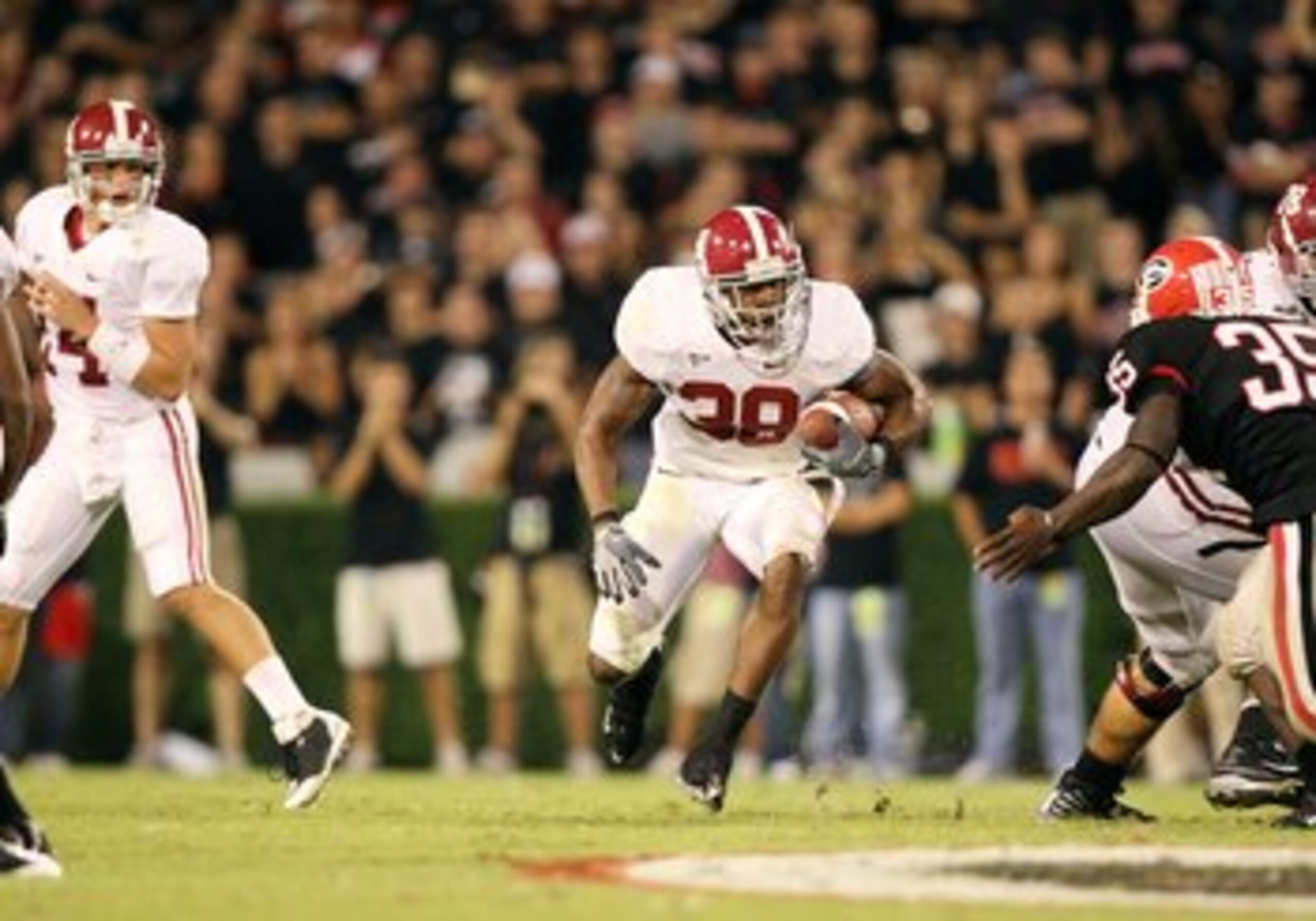 TUSCALOOSA, AL - OCTOBER 16: Dont'a Hightower #30 of the Alabama Crimson Tide pressures quarterback Jeremiah Masoli #8 of the Ole Miss Rebels at Bryant-Denny Stadium on October 16, 2010 in Tuscaloosa, Alabama. (Photo by Kevin C. Cox/Getty Images) TUSCALOOSA, AL - OCTOBER 16: Dont'a Hightower #30 of the Alabama Crimson Tide pressures quarterback Jeremiah Masoli #8 of the Ole Miss Rebels at Bryant-Denny Stadium on October 16, 2010 in Tuscaloosa, Alabama. (Photo by Kevin C. Cox/Getty Images)