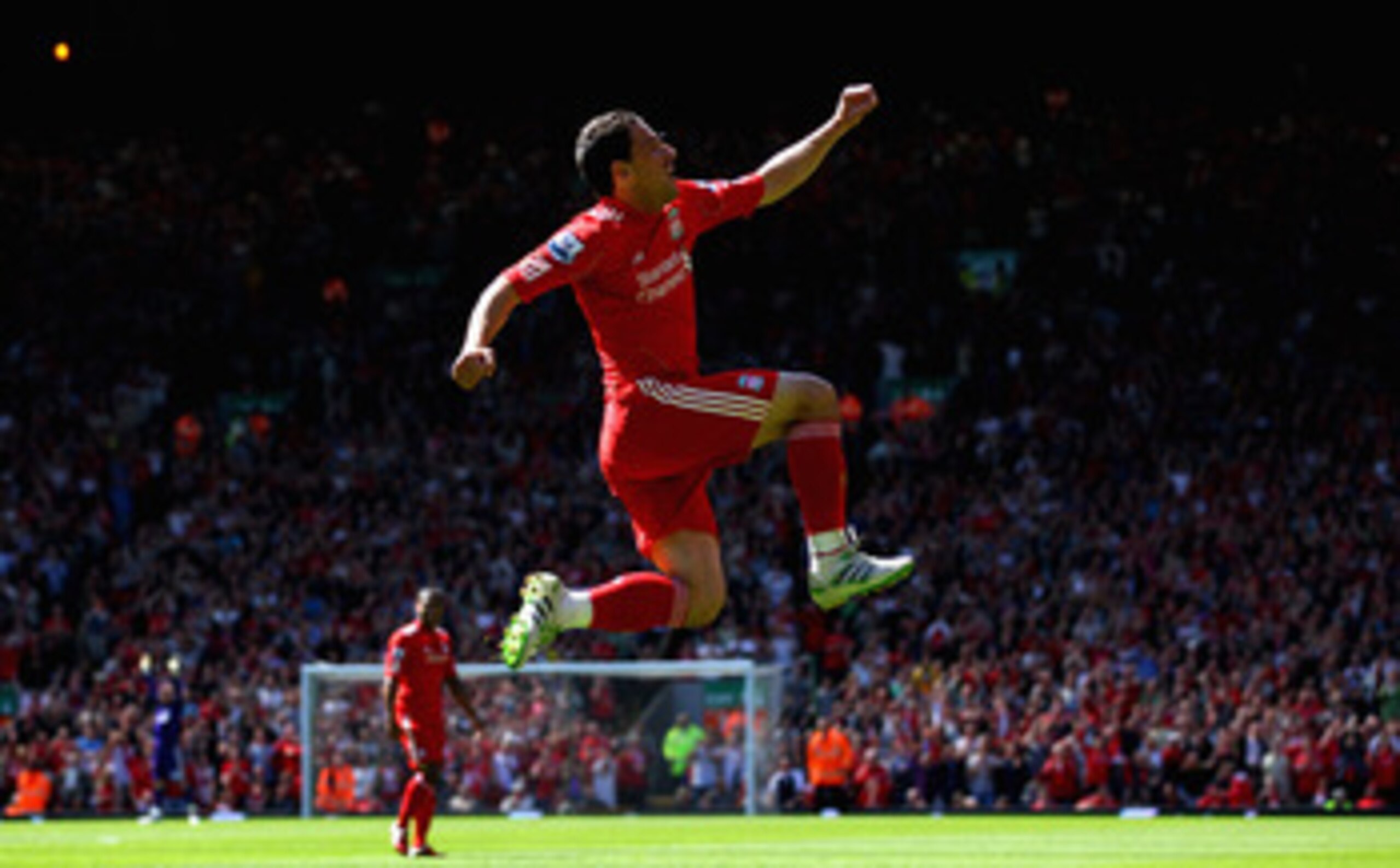 LIVERPOOL, ENGLAND - MAY 01:  Maxi Rodriguez of Liverpool leaps into the air to celebrate after scoring the first goal during the Barclays Premier League match between Liverpool  and Newcastle United at Anfield on May 1, 2011 in Liverpool, England.  (Phot