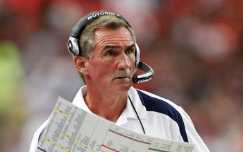 ATLANTA - NOVEMBER 16:  Head coach Mike Shanahan of the Denver Broncos looks at his playbook against the Atlanta Falcons during the game at the Georgia Dome on November 16, 2008 in Atlanta, Georgia.  (Photo by Kevin C. Cox/Getty Images)