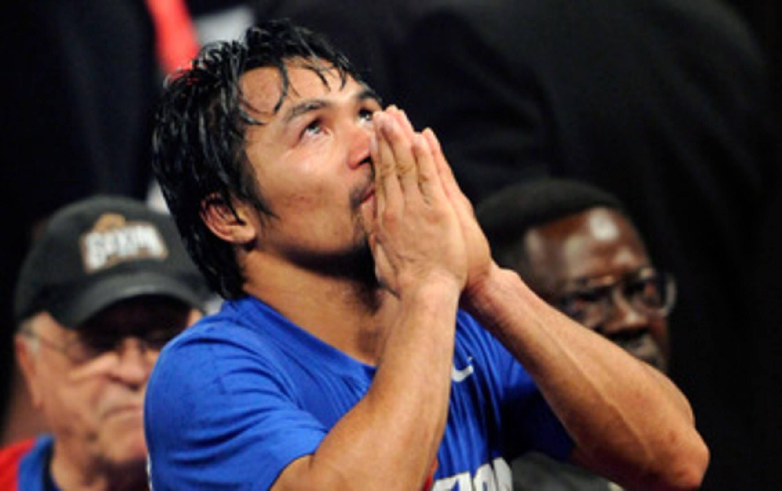 LAS VEGAS, NV - MAY 07: Boxer Manny Pacquiao reacts at the end of his WBO welterweight title fight against Shane Mosley at the MGM Grand Garden Arena May 7, 2011 in Las Vegas, Nevada. Pacquiao retained his title by unanimous decision. (Photo by Ethan Mi LAS VEGAS, NV - MAY 07: Boxer Manny Pacquiao reacts at the end of his WBO welterweight title fight against Shane Mosley at the MGM Grand Garden Arena May 7, 2011 in Las Vegas, Nevada. Pacquiao retained his title by unanimous decision. (Photo by Ethan Mi