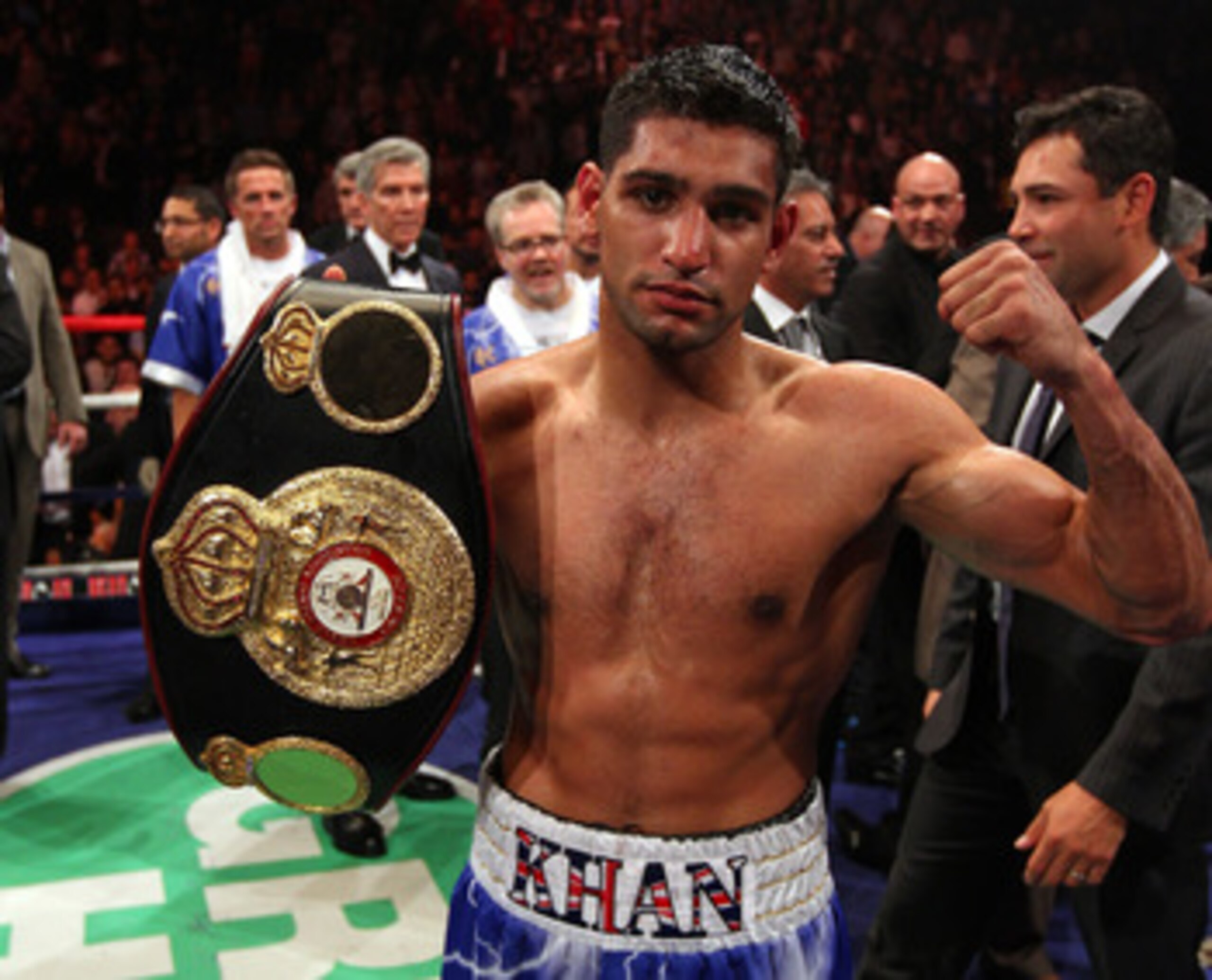 MANCHESTER, ENGLAND - APRIL 16: Amir Khan celebrates after victory over Paul McCloskey in the WBA Light-Welterweight Championship fight between Amir Khan and Paul McCloskey at MEN Arena on April 16, 2011 in Manchester, England. (Photo by Alex Livesey/Ge MANCHESTER, ENGLAND - APRIL 16: Amir Khan celebrates after victory over Paul McCloskey in the WBA Light-Welterweight Championship fight between Amir Khan and Paul McCloskey at MEN Arena on April 16, 2011 in Manchester, England. (Photo by Alex Livesey/Ge